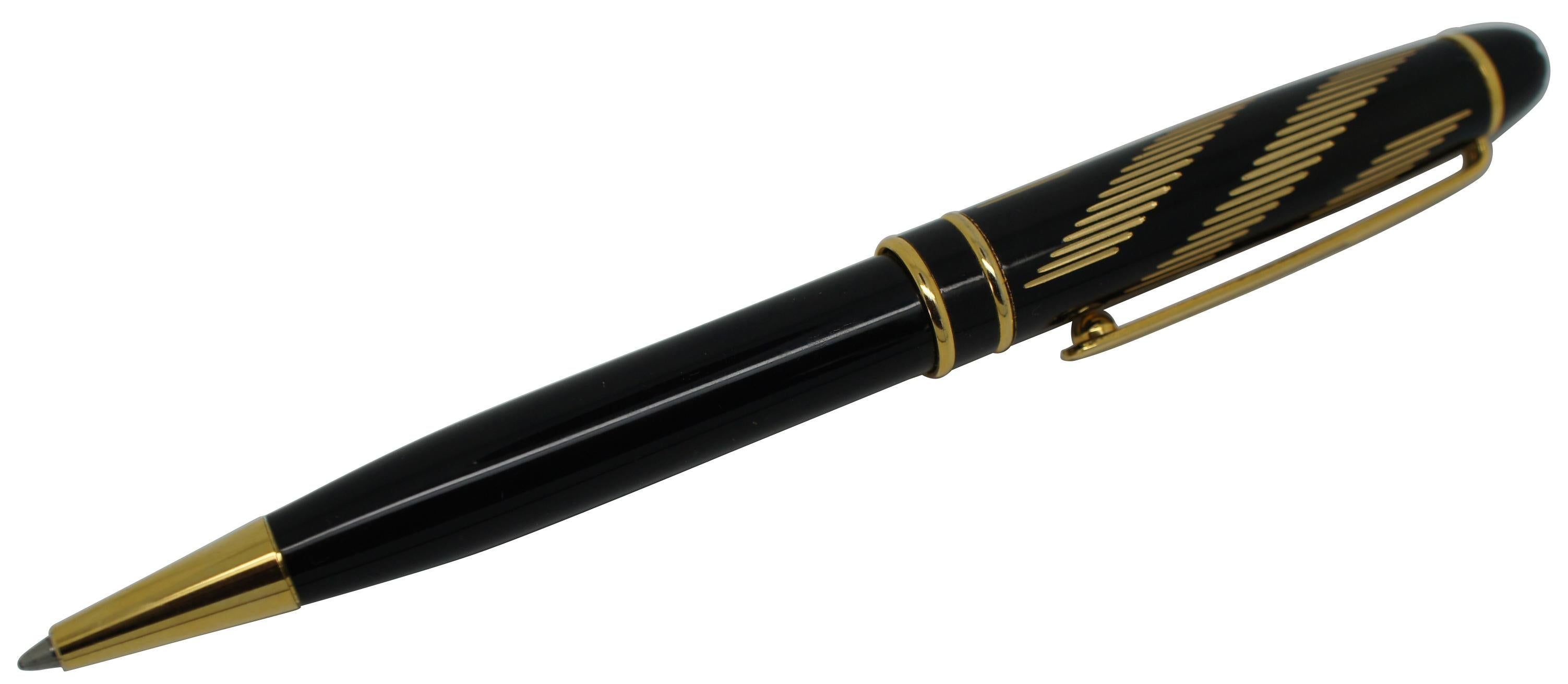 Vintage Montblanc Solitaire ballpoint pen in black with a gold hatch mark diagonal stripes on the barrel.
  