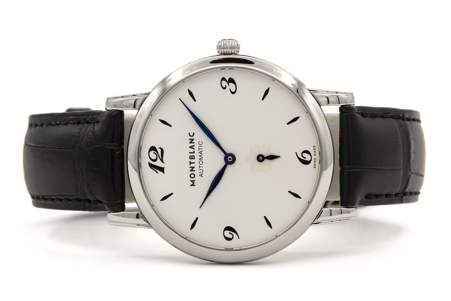 We are pleased to offer this excellent condition Montblanc Star Classique White Dial Men's Watch 107073 . This watch features a 39mm stainless steel case with skeleton case back, black alligator leather strap, fixed stainless steel bezel, white dial