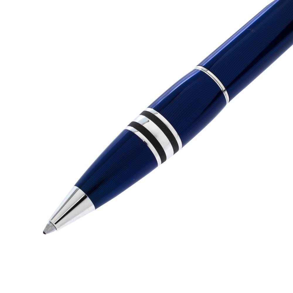 Showcasing cool blue resin body contrasted with silver-toned accents, this StarWalker ballpoint pen is yet another unique design from the house of Montblanc. Featuring aftermarket diamonds on the clip, this pen carries blue ink and provides the best
