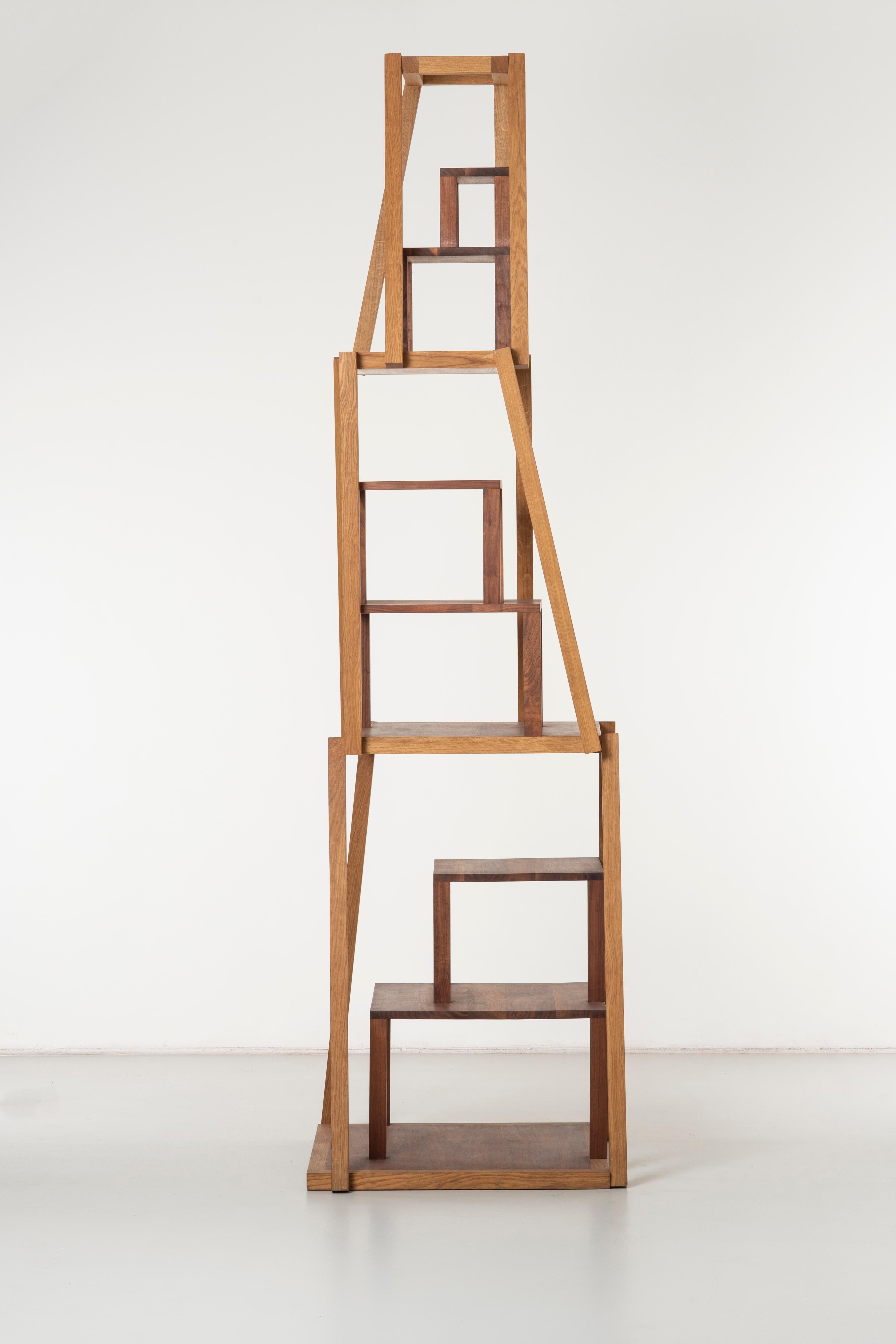 Montefeltro bookcase by Michele De Lucchi.
Italy, 2008. Prototype. Limited Edition of 6 examples. Oak frame, walnut elements, linseed oil finishing. Signed: M. de Lucchi 2008. Measures: 70 x 75 x 266 H cm, 27.6 x 29.5 x 104.7 H in.
Please note: