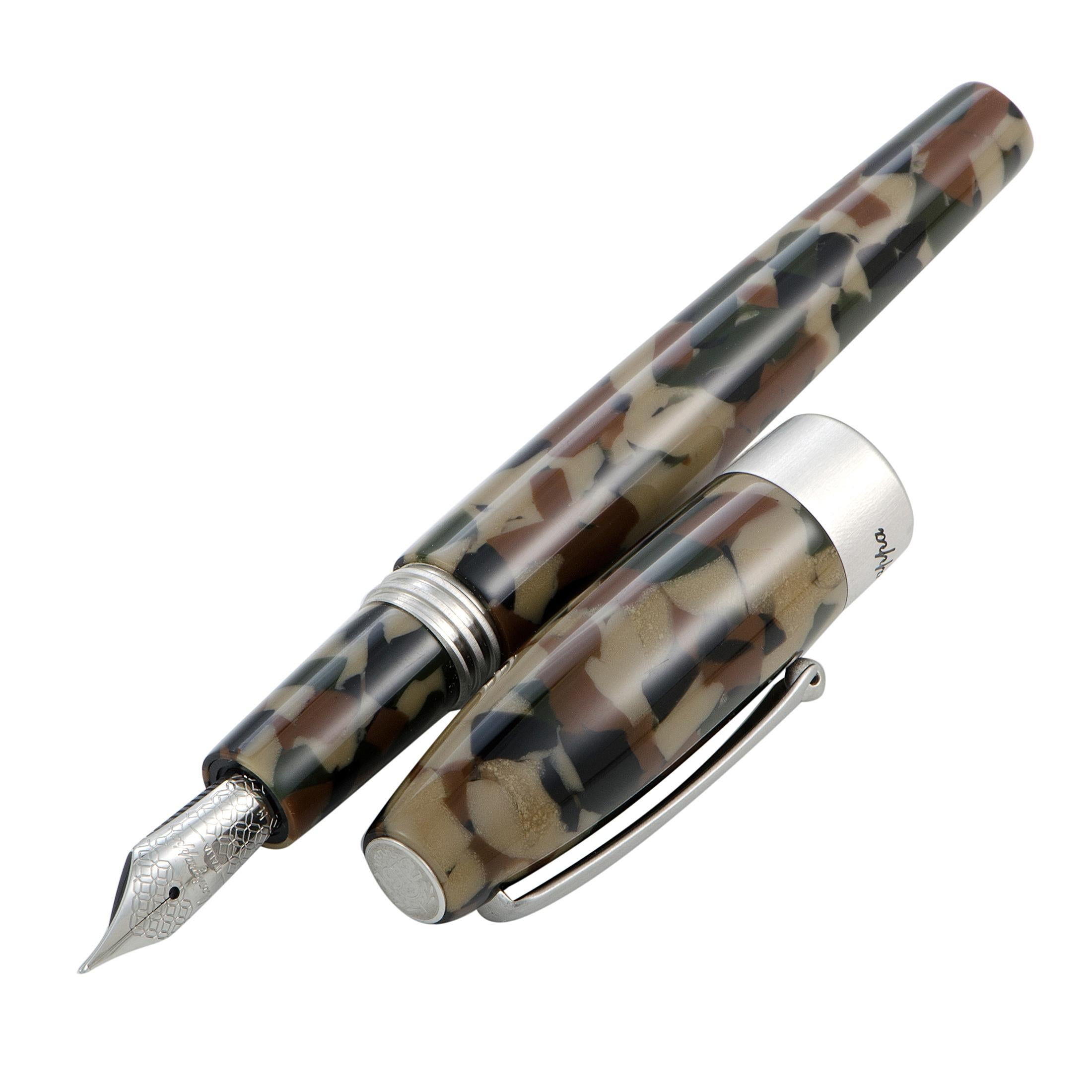 A fascinating item from Montegrappa’s “Fortuna” series, this exquisite fountain pen combines exceptional practicality with a distinctly masculine camouflage design into creating a piece of immense value, perfect either as a gift to yourself or for