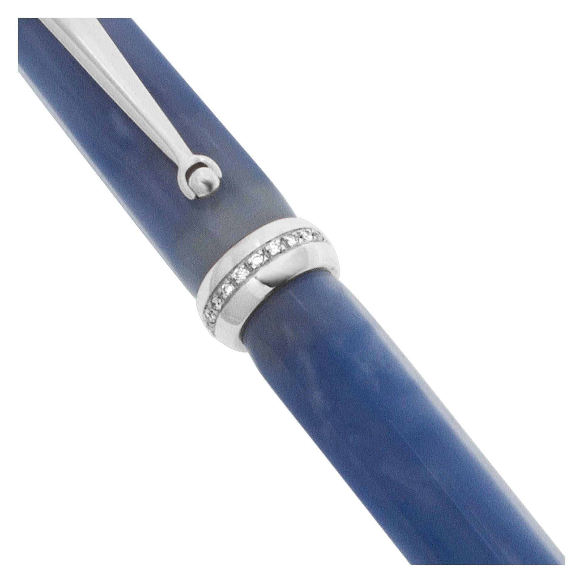 Montegrappa micra diamond fountain pen, octagonal pearlized in clear blue resin with sterling silver trim and medium 18K gold nib. Natural, brilliant cut diamonds. Count: 21, 0.27ct total weight. Clarity: VS2-SI1. Color: H. Length: 4.4in. Width: