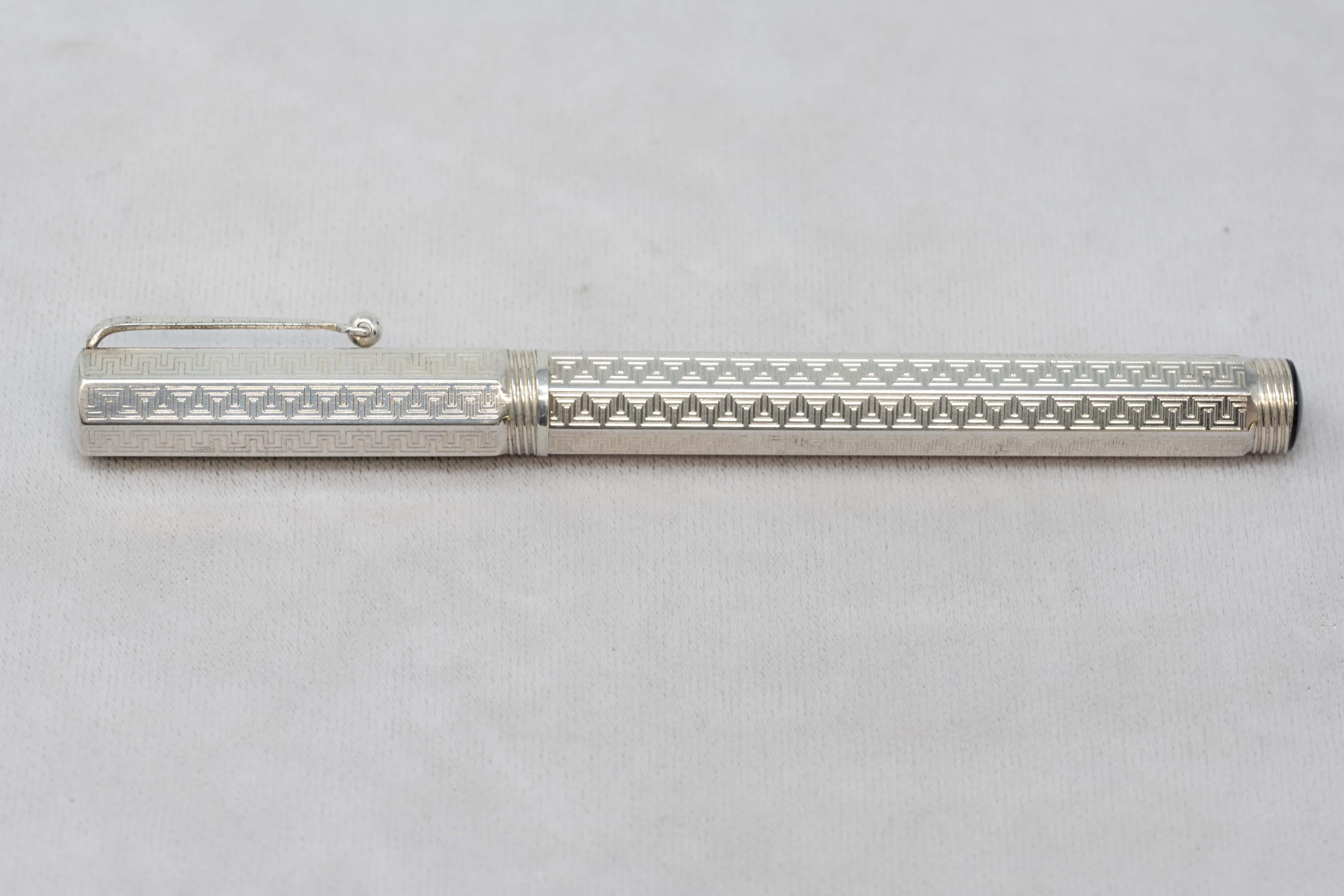 Montegrappa reminiscence fountain pen made in solid sterling silver marked. Nib is marked 585, Made in Vicenza Italy. Pen measures 12.6 cm long, with no refill and no box. In good condition, with no scratches or imperfections, and no engravings.