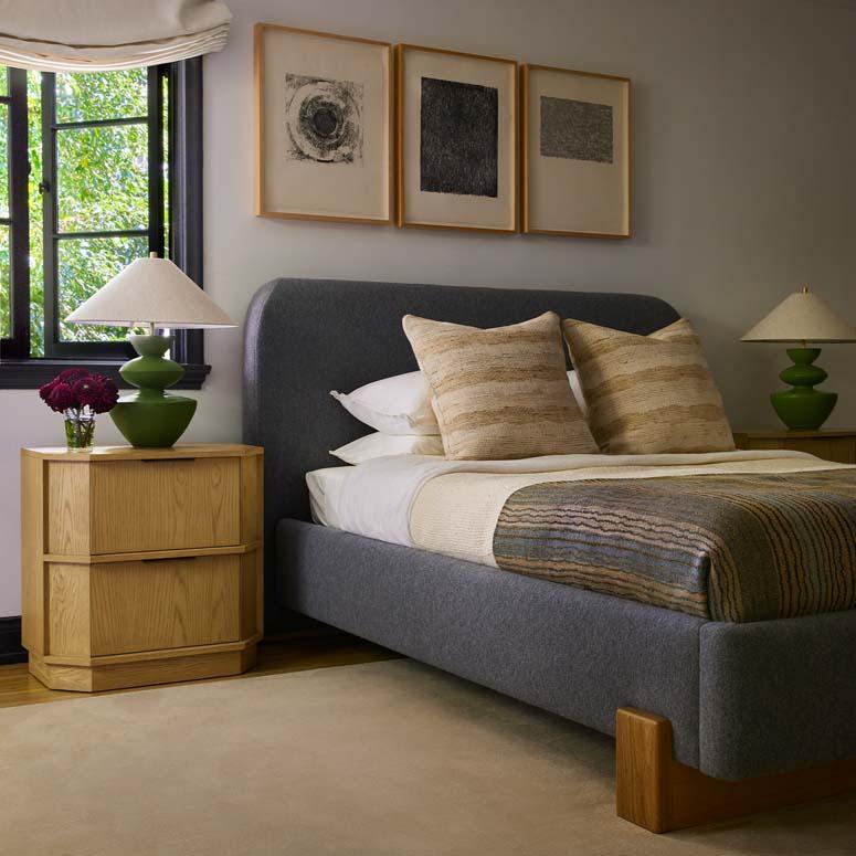 The Monterey bed calls to the streamlined shapes of Art Deco train cars with a curved headboard and soft corners. The bed sits atop a monolithic leg that is inspired by railroad ties. 

The DISC Interiors x LF six-piece capsule collection pulls