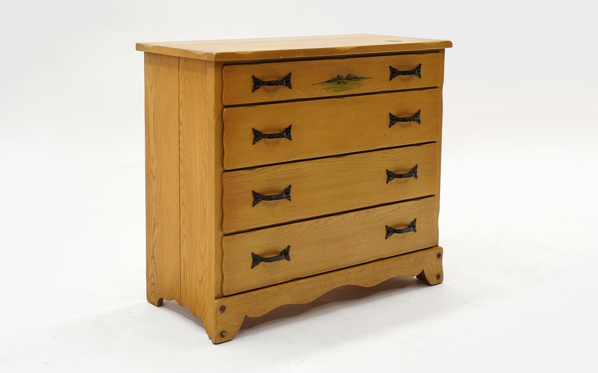 Rancho Monterey four drawer dresser / chest of drawers. Hand crafted and hand hammered pulls. Good condition with a significant blemish on the top as seen in the photos. It is made of solid oak so is relatively easy to have the top refinished. Rare