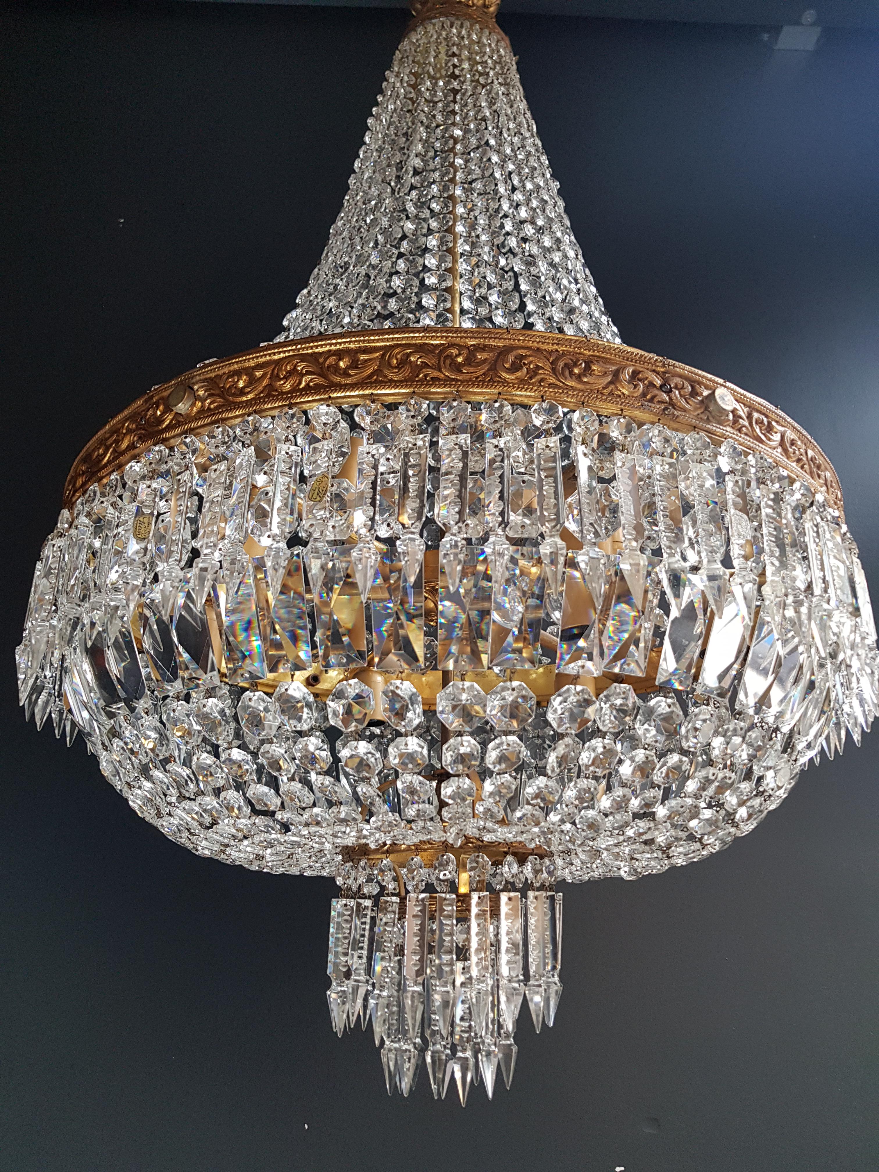 Cabling and sockets completely renewed. Crystal hand knotted
Measures: Total height 140 cm, height without chain: 110 cm, diameter 60 cm, weight (approximately) 15 kg.

Number of lights: 9-light bulb sockets: E27


Montgolfiè Empire brass sac a