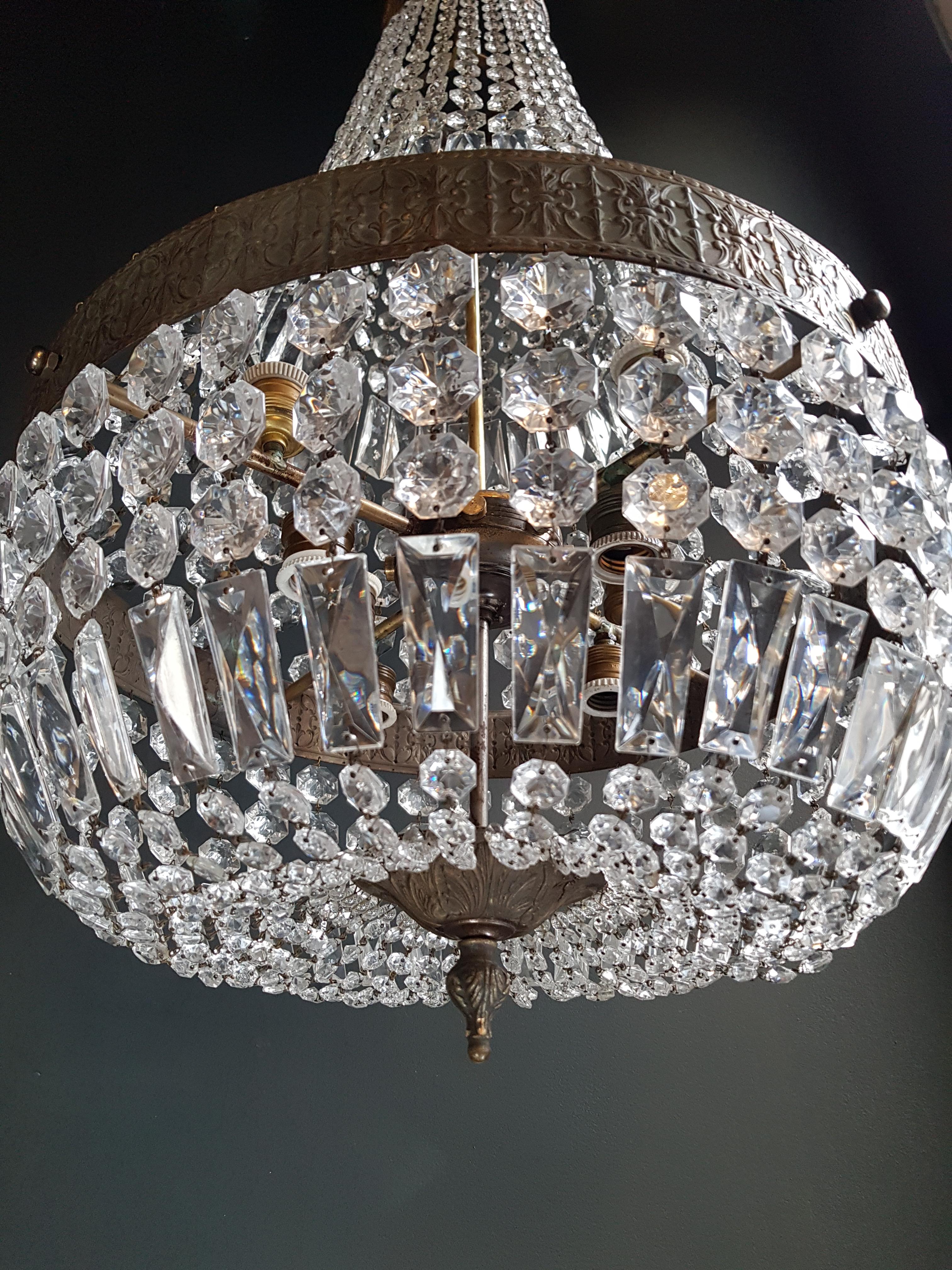 Montgolfièr Empire Sac a pearl chandelier crystal Lustre ceiling lamp 

Measures: Total height 130 cm, height without chain 87 cm, diameter 51 cm. Weight (approximately): 8kg.

Number of lights: 8-light bulb sockets: E27 material: Brass,