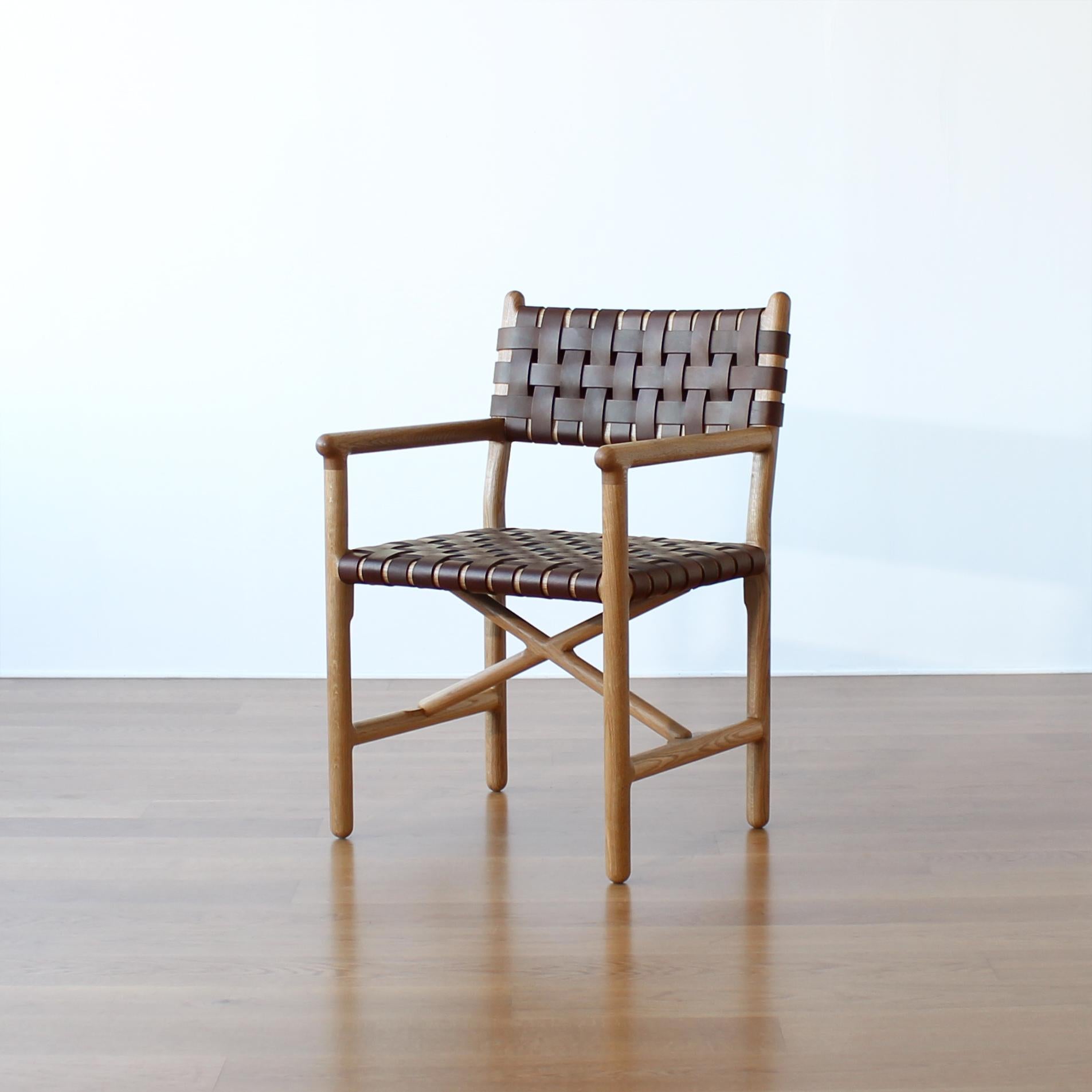 Montgomery arm chair by Crump and Kwash 

Hand shaped white oak frame / commercial finish / handwoven hickory brown leather seat and back / nylon glides

Also available with black leather, and without arms.

