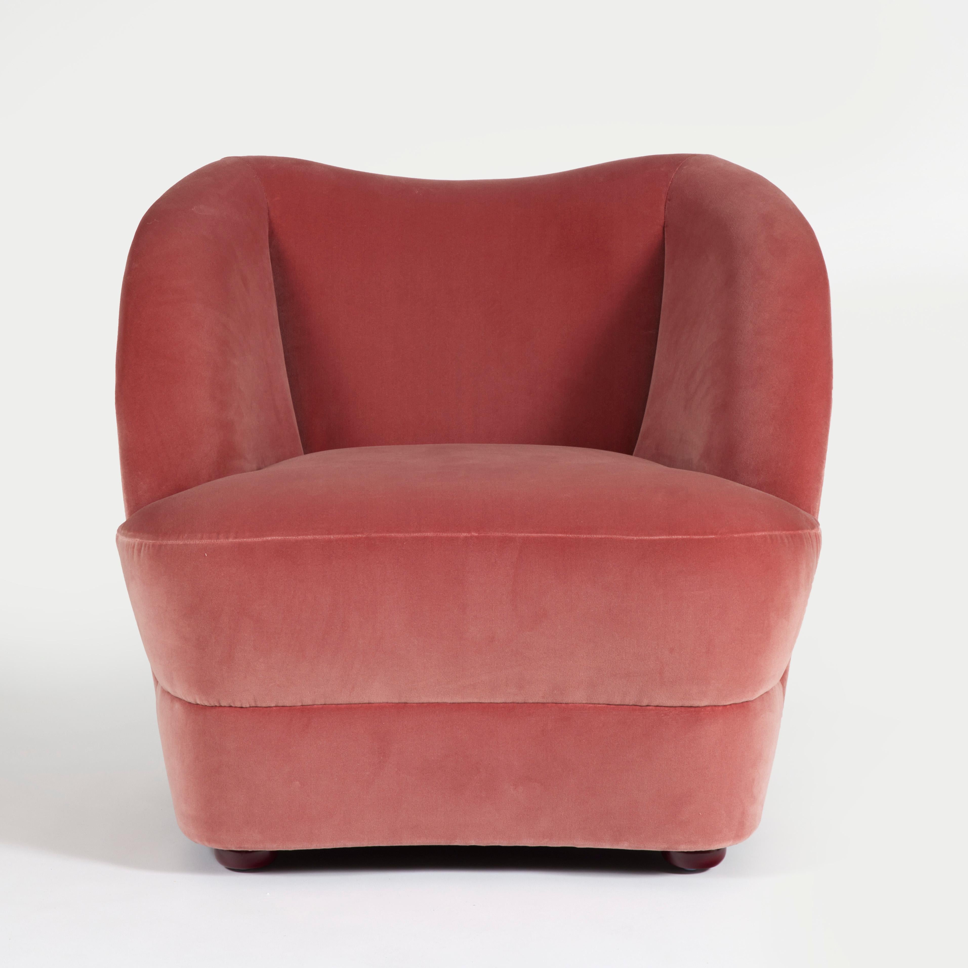 All over upholstered armchair in velvet with lacquered wooden feet.
Made in France.
  