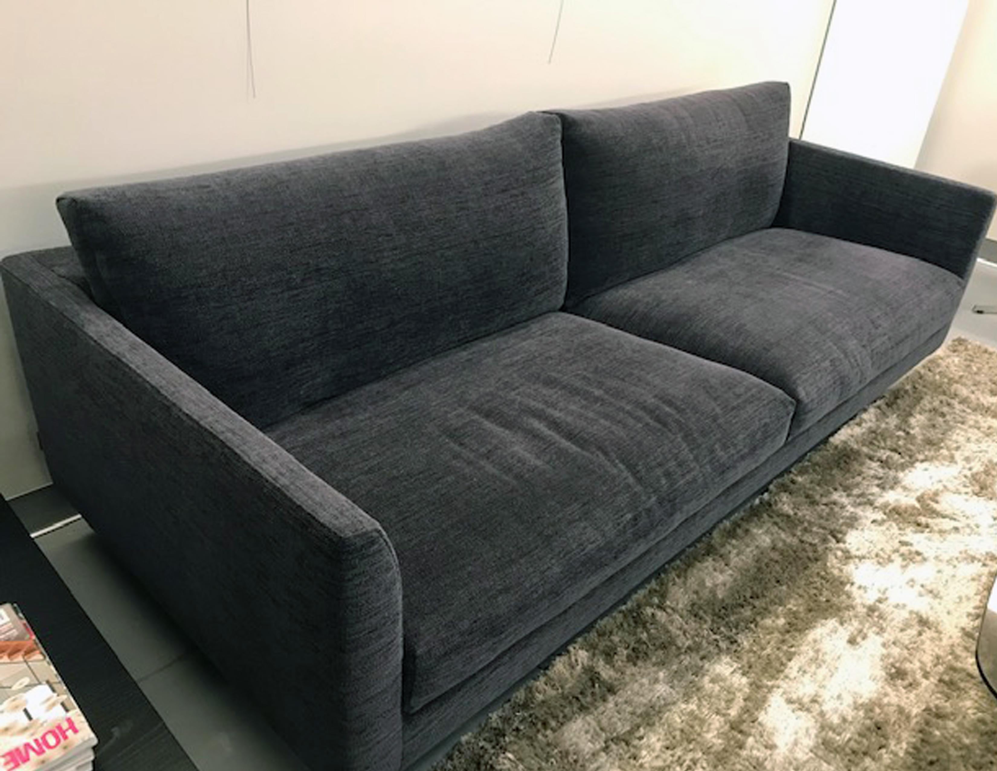 The AXEL, with its broad seats, is a Dutch seating landscape. This sober design, unrivaled in comfort, has grown to be an icon of our time. Its notable frame, almost entirely hidden from view, creates an open appearance. The elements come finished