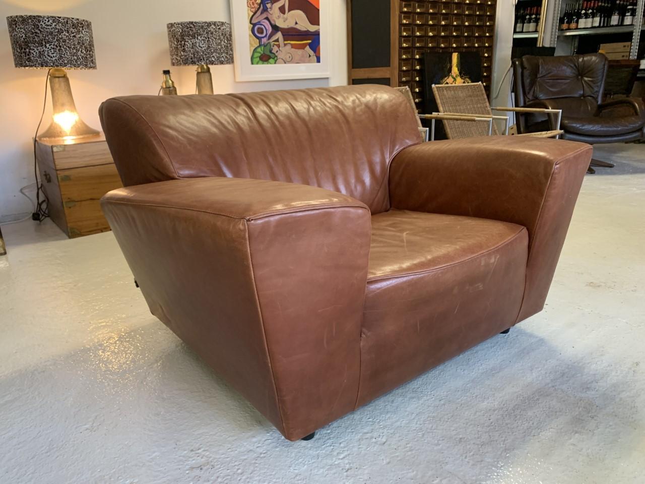 Big Chunky lounge chair in thick buffalo leather designed by Gijs Papavoine fr Montis in the 1980s. He wanted to create a big comfy lounge chair that gives you the same feeling as sitting in a big Chevrolet Corvette.. So that's why he named the