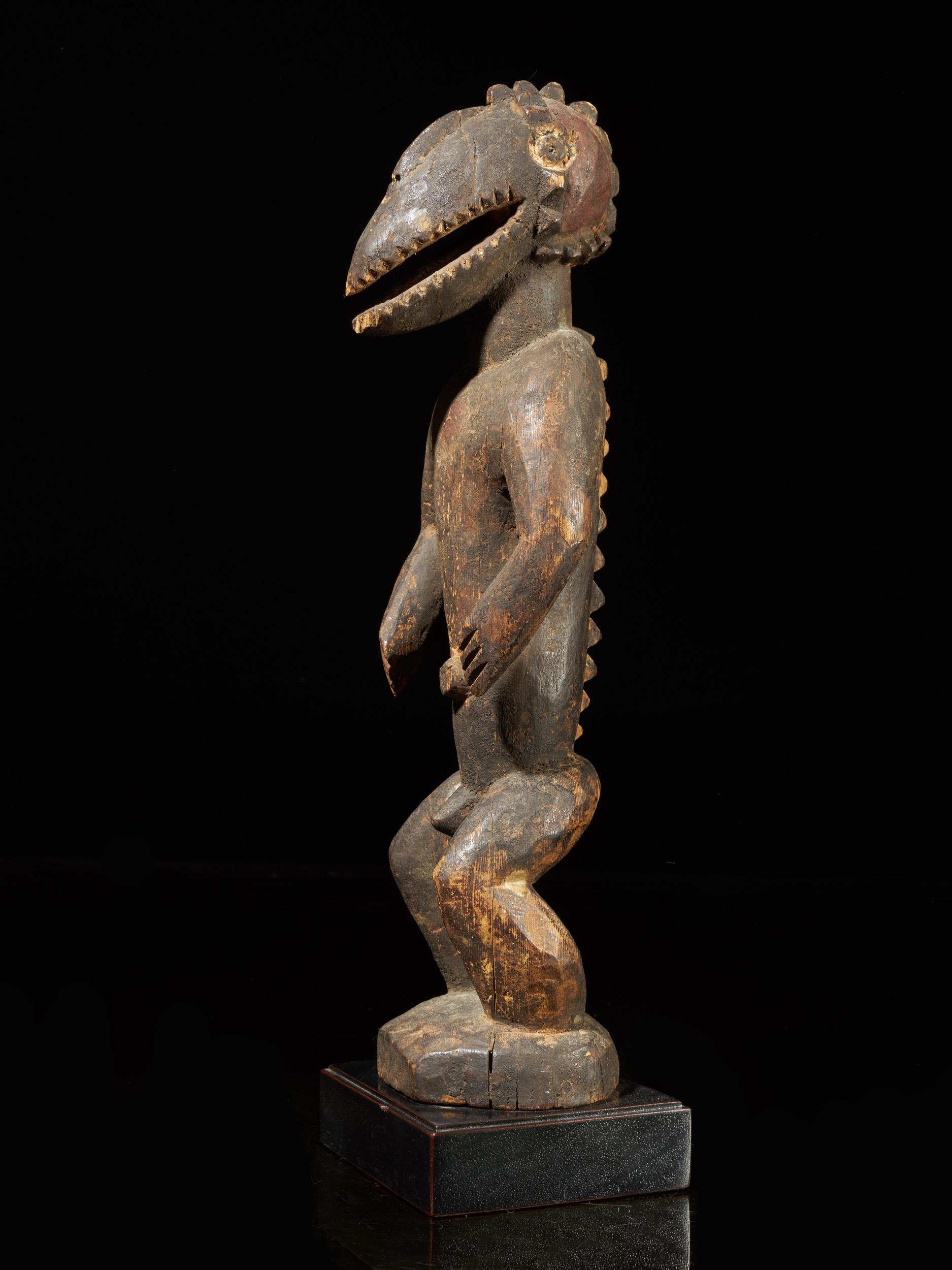 Montol-Goemai wooden statue combined with Gugwom-like head.