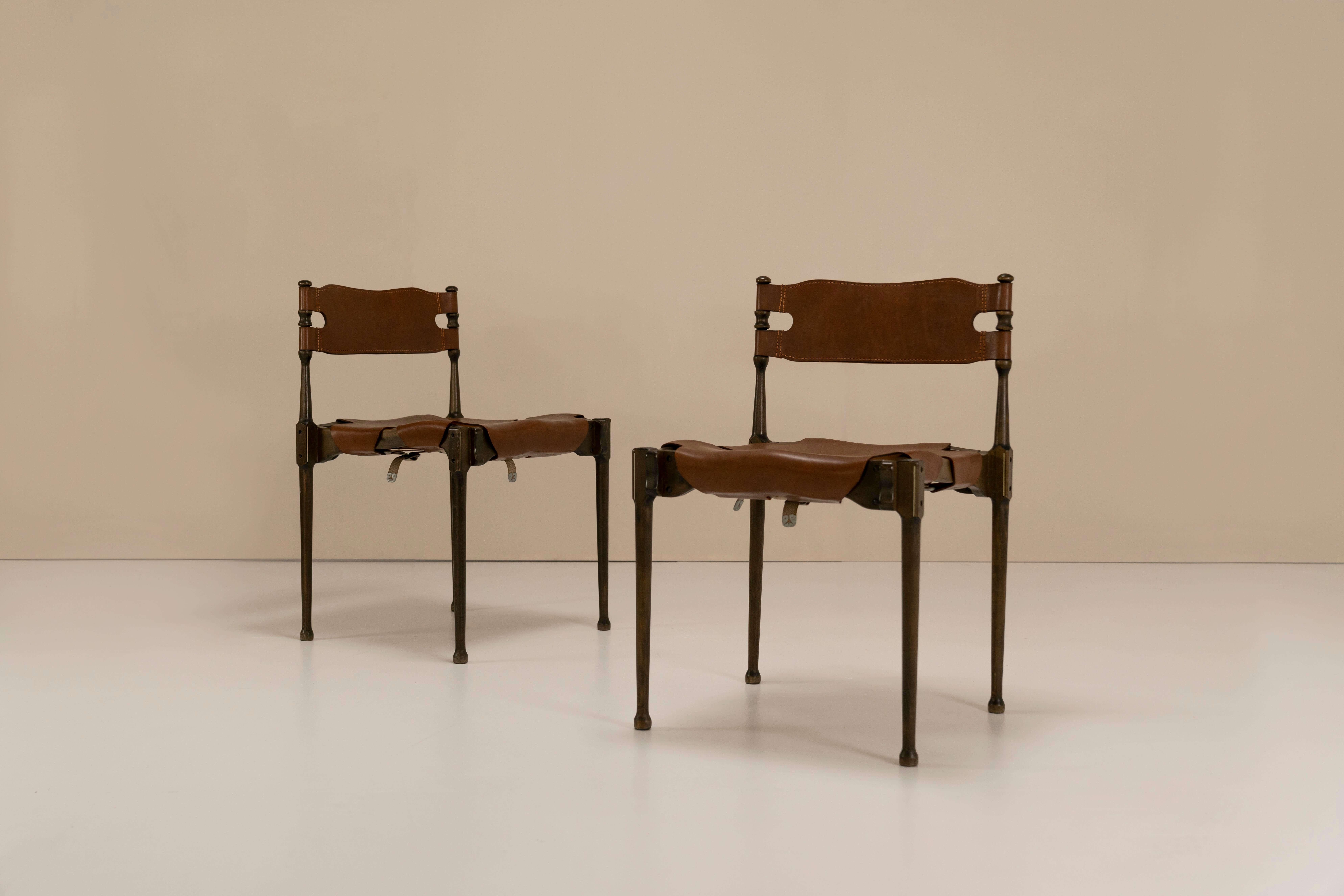 Extraordinary “Montreal” chairs designed by Otto Frei in stained beech and leather from 1967. The German architect Otto Frei rose to prominence in 1967 when he was commissioned to design the German pavilion at the world expo in Montreal Canada. He