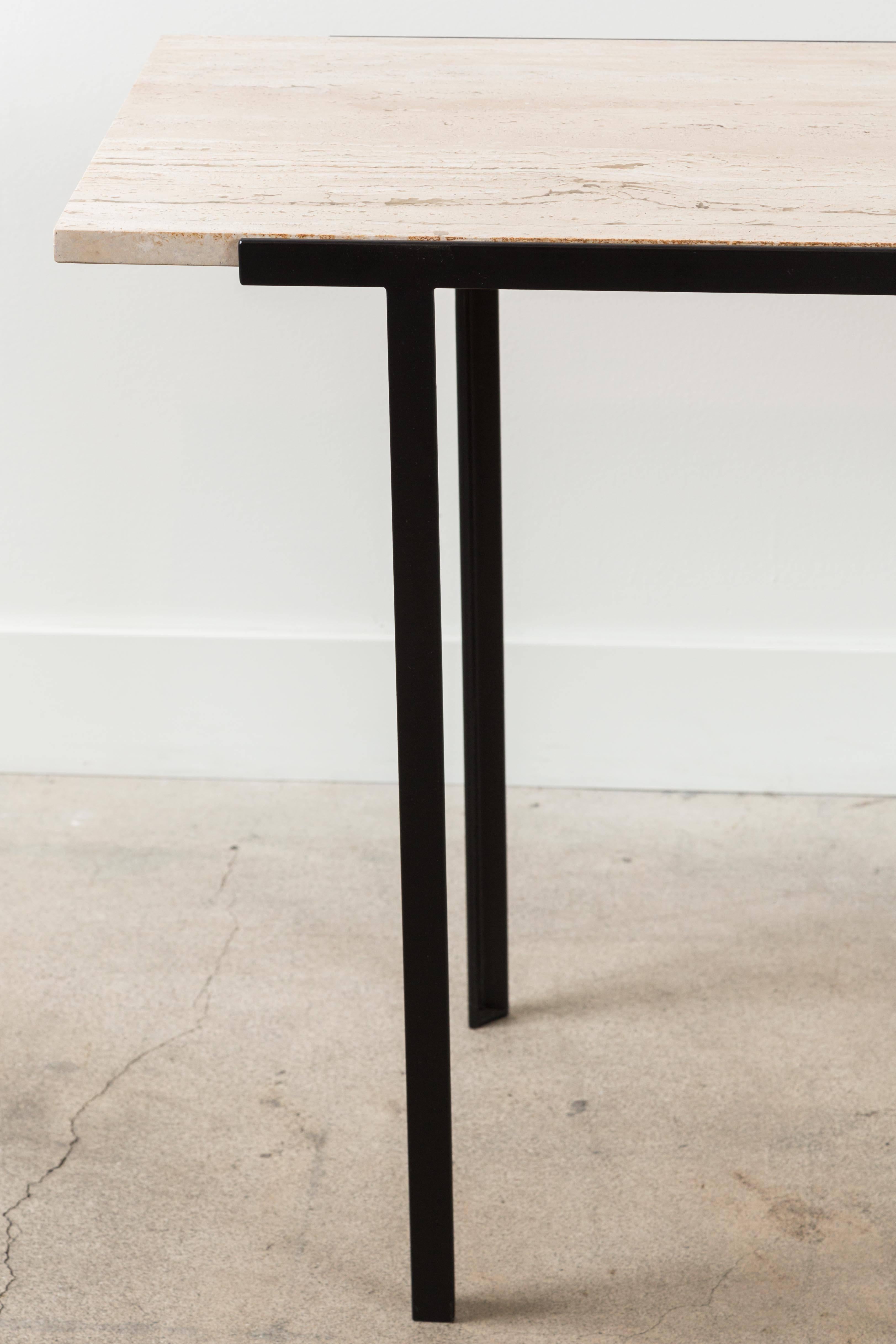The Montrose console table features a powder-coated steel base with a minimal honed open grain travertine stone top. For indoor or outdoor use.

The Lawson-Fenning Collection is designed and handmade in Los Angeles, California.

Available to order
