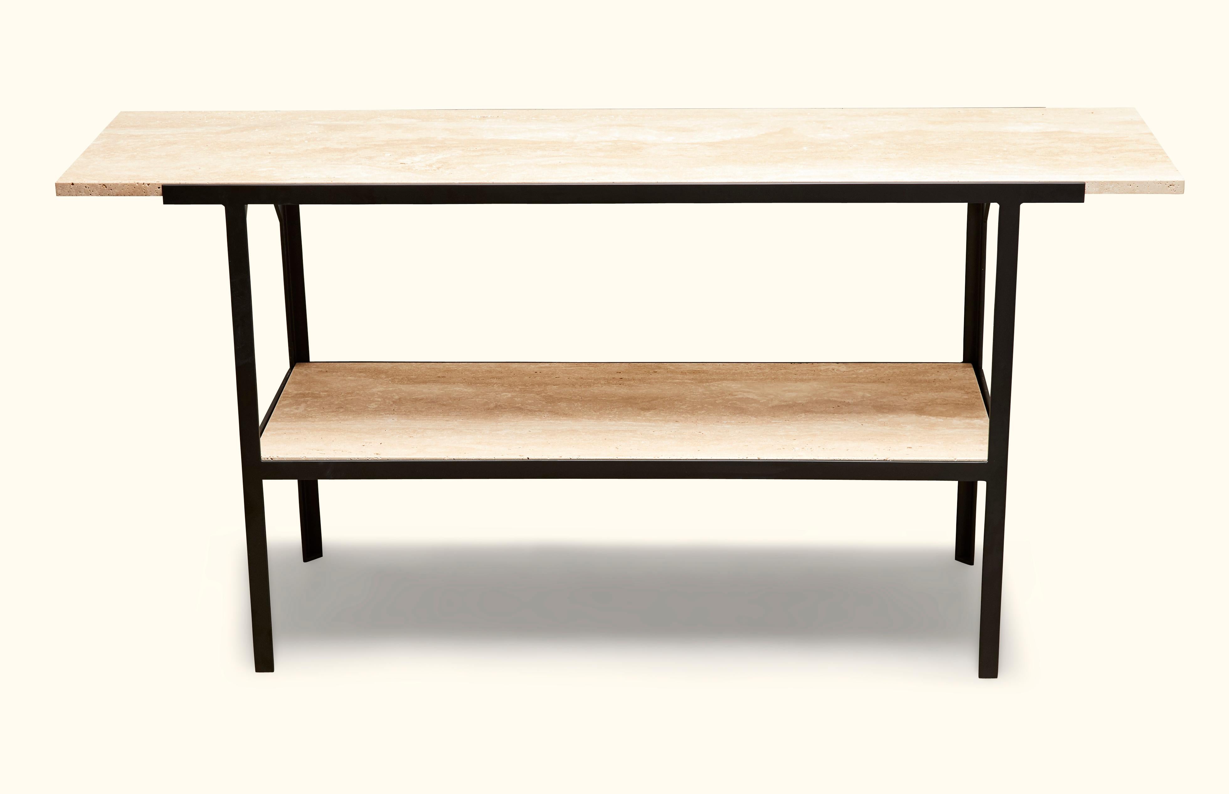 The Montrose console table with shelf features a powdercoated steel base with a minimal honed travertine stone top. For indoor or outdoor use. 

The Lawson-Fenning Collection is designed and handmade in Los Angeles, California.

Can be made to order