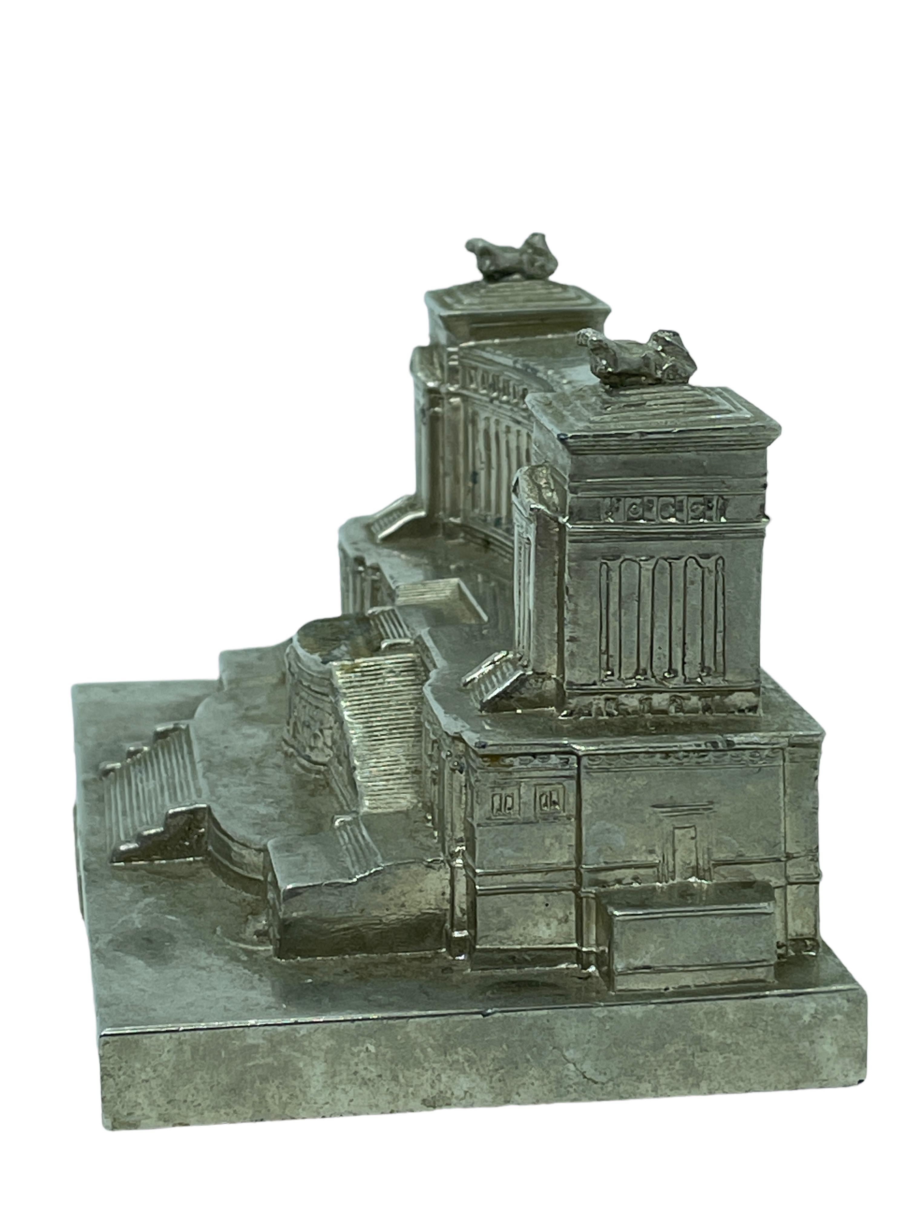 A 1960s souvenir building architectural model. Some wear with a nice patina, but this is old-age. Made of metal. A beautiful nice desktop item or just a display item in your collections of souvenirs from around the world.

 