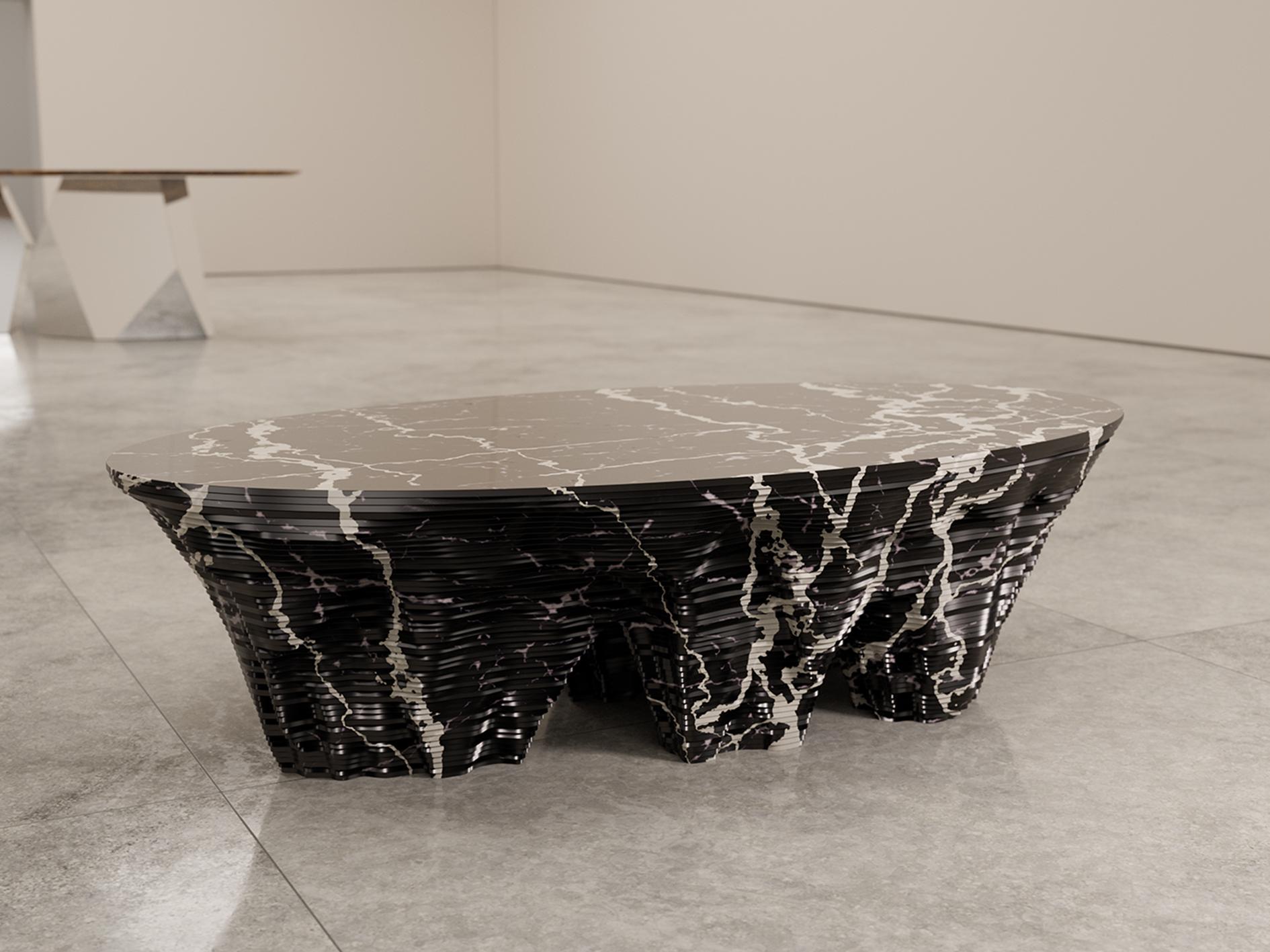 A stylish piece of modern, statement-furniture design from British designer Christopher Duffy.  A unique marble coffee table for the modern home.

For the Monument valley coffee table Duffy London casts an eye across the American West and sandstone