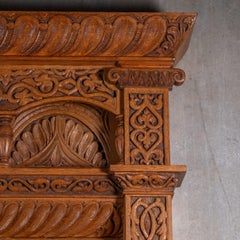 Monumental 1893 Renaissance Revival Carved Oak Fireplace Mantel with Overmantel
