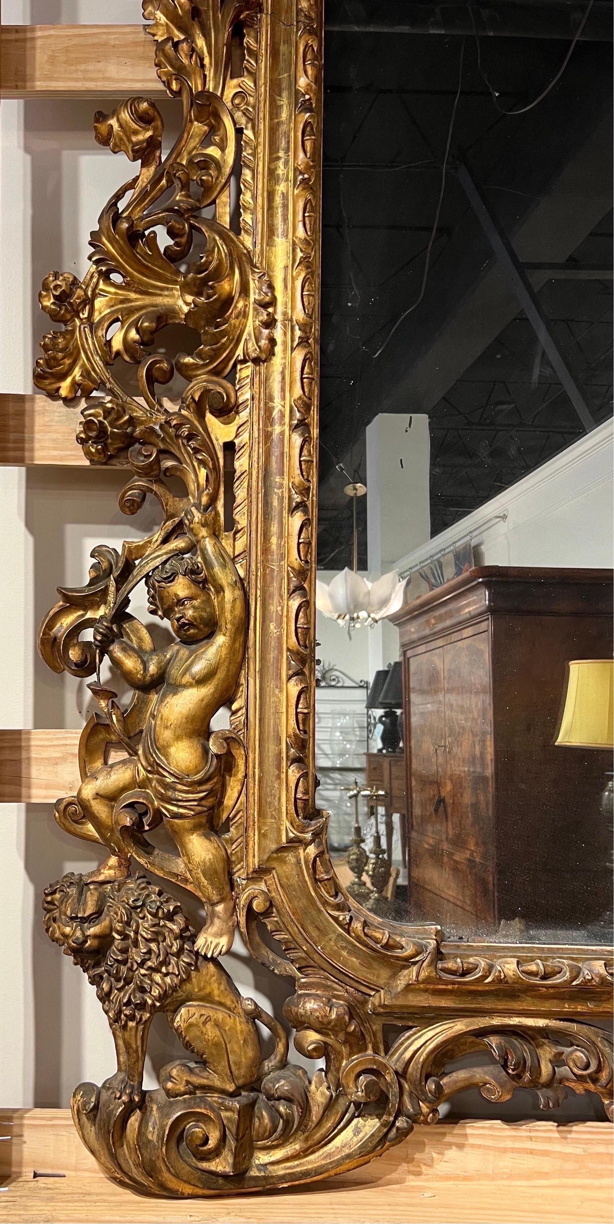 19th Century Monumental 18th-19th century Giltwood mirror with coat of arms  For Sale