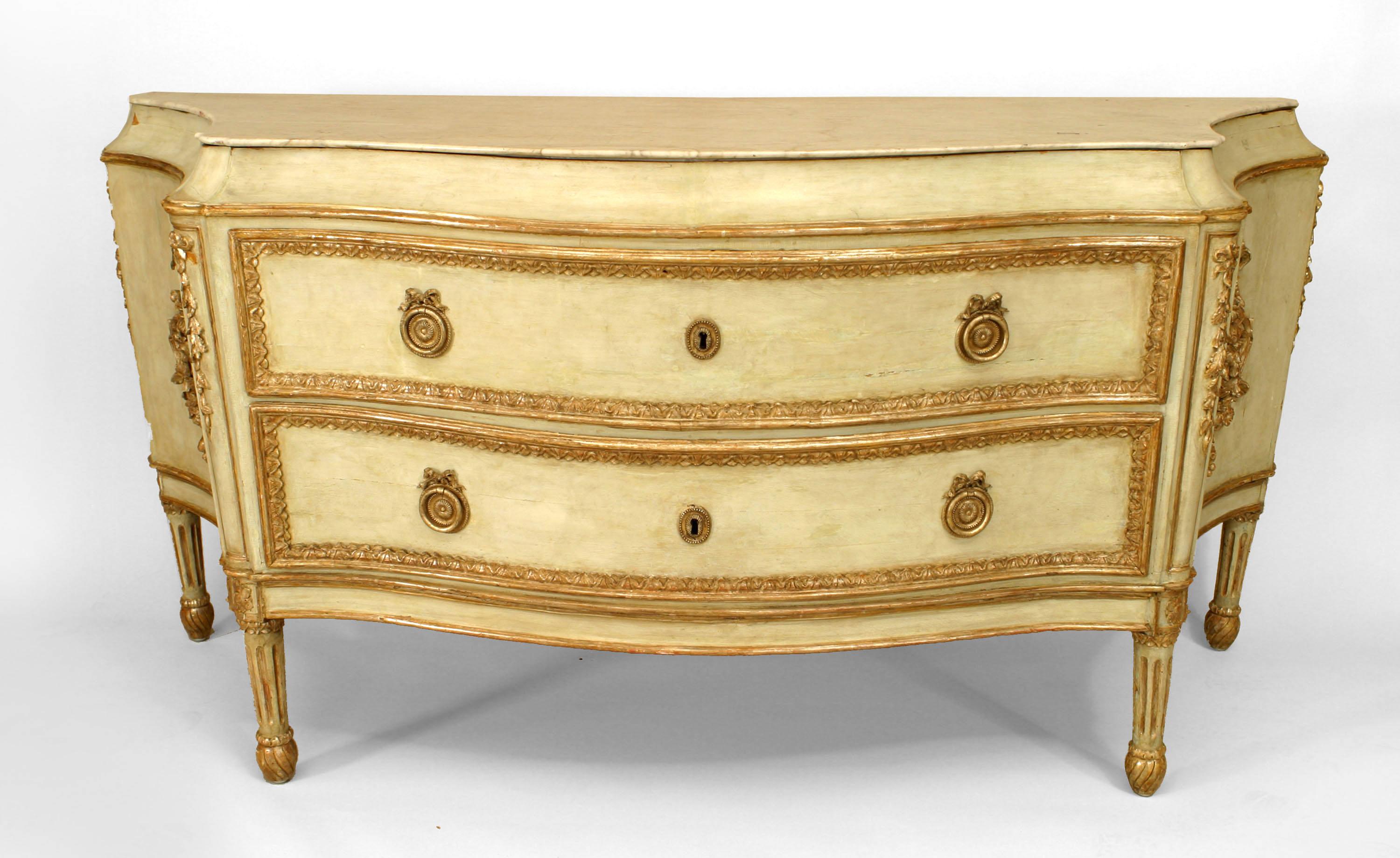 Italian Neo-classic (18th Century) Ivory with green undertones painted monumental commode with gold gilt carved trim on sides and 2 drawers under a white serpentine shaped marble top
