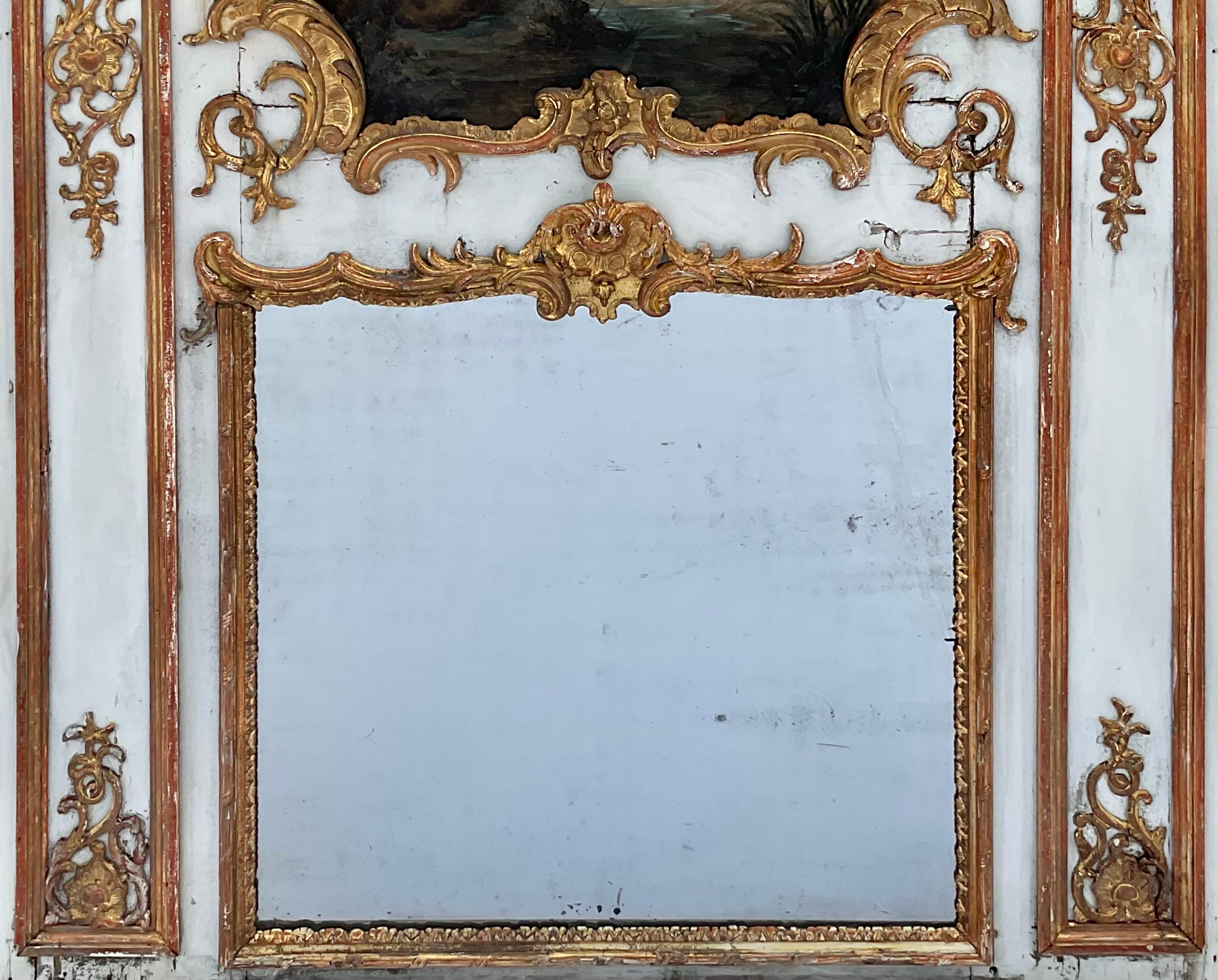 Louis XV Monumental miroir Trumeau en bois doré français du 18ème siècle avec peinture d'origine en vente