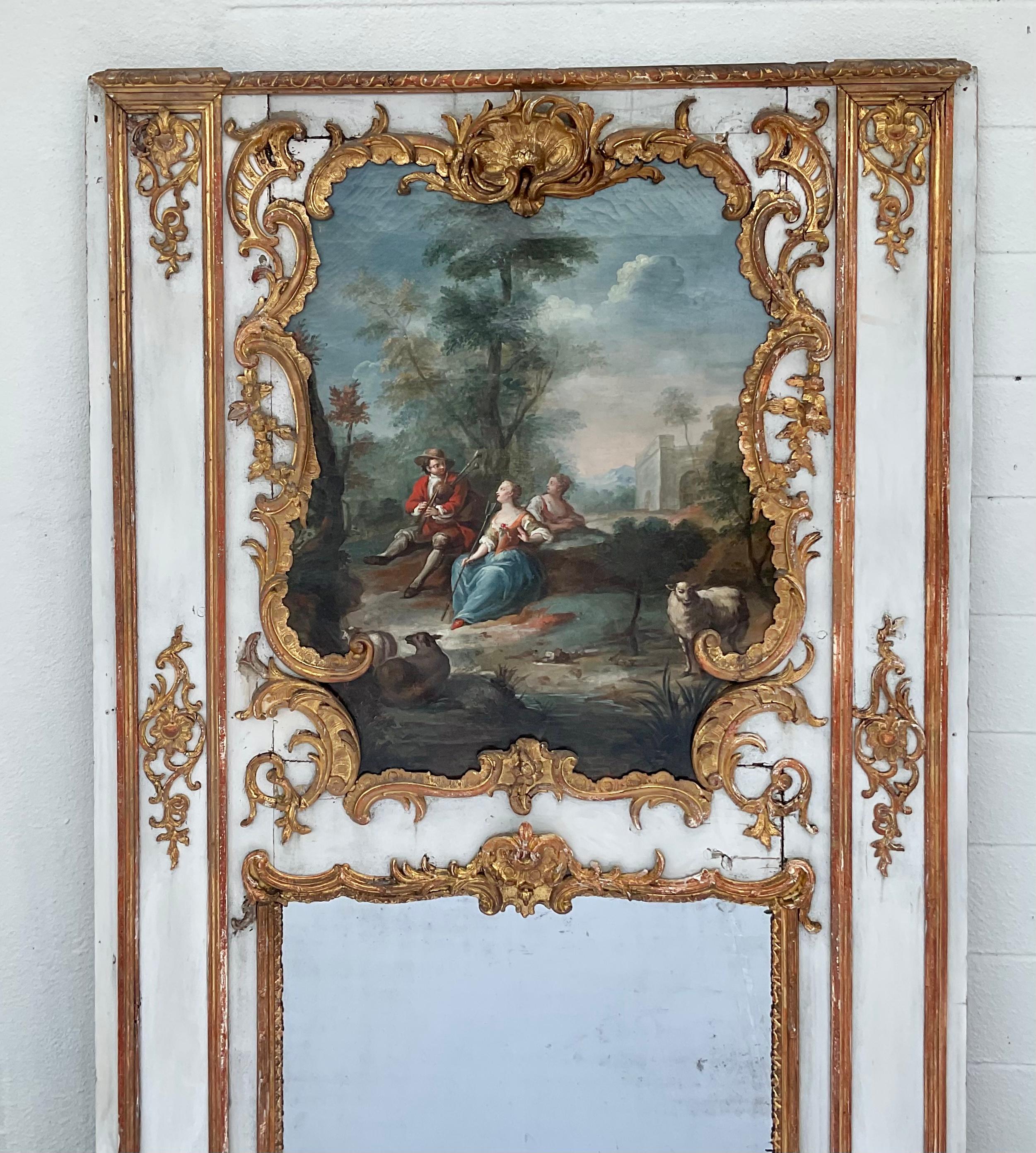 Miroir Monumental miroir Trumeau en bois doré français du 18ème siècle avec peinture d'origine en vente