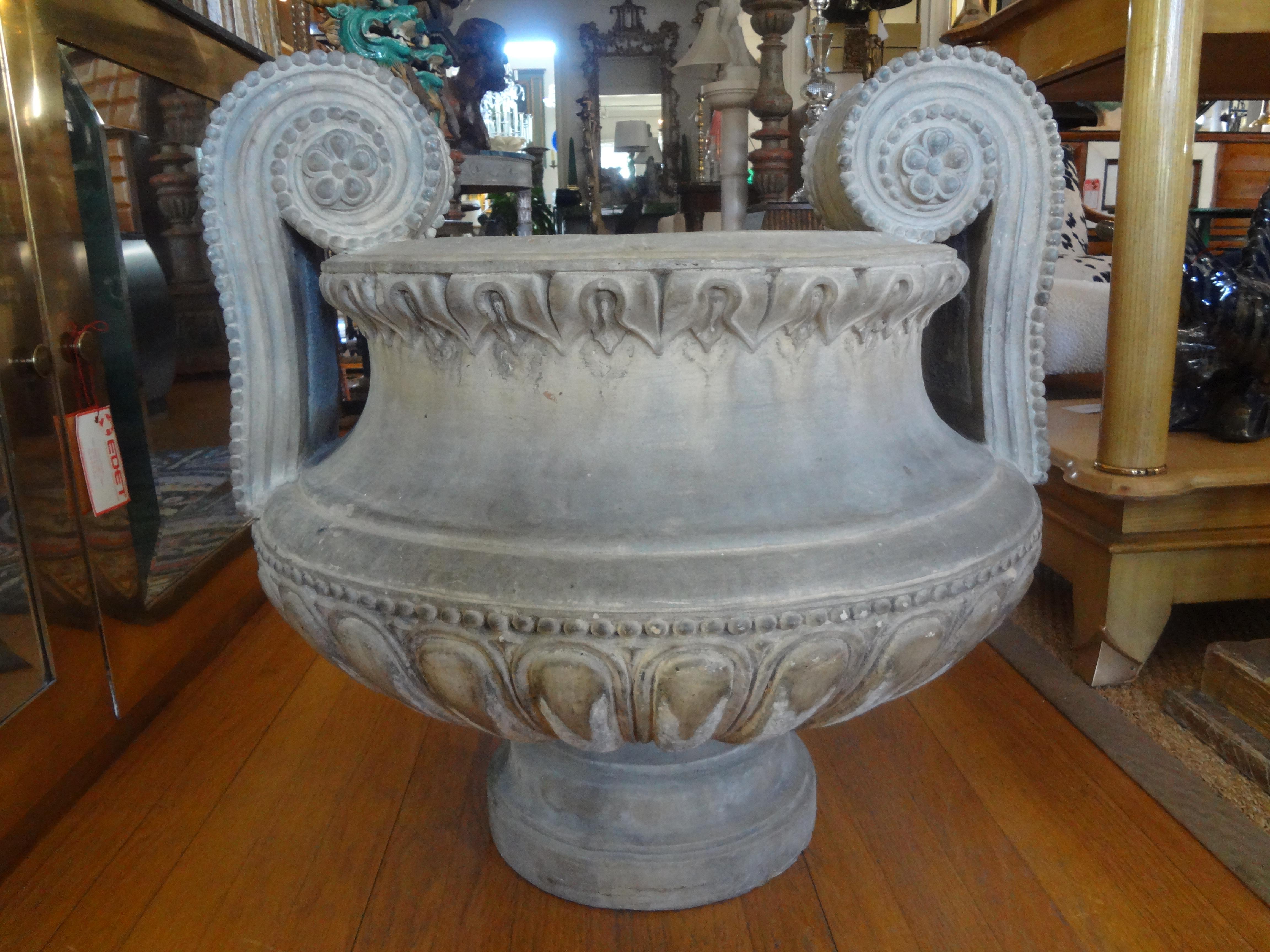 Monumental 18th century French Louis XVI terracotta urn.
This stunning 18th century French Louis XVI terra cotta garden urn, garden ornament, jardiniere or planter has a Grecian feel and would look equally as well indoors or outdoors. Stunning from