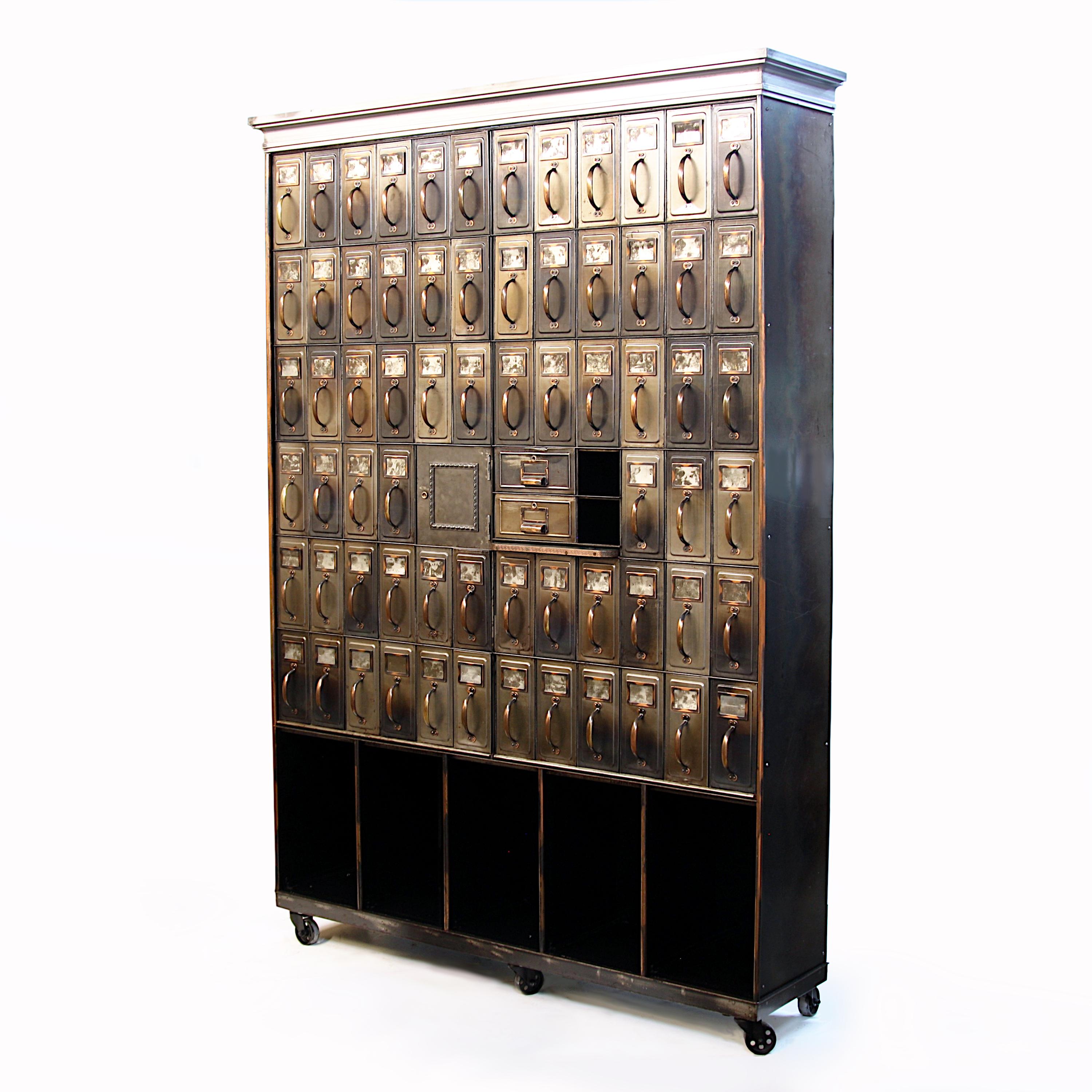 This spectacular turn-of-the-century era file cabinet was recently pulled from the vault of a western Iowa courthouse where it has sat for nearly 120 years! The entire exterior (other than the back) has been hand-stripped and polished to showcase