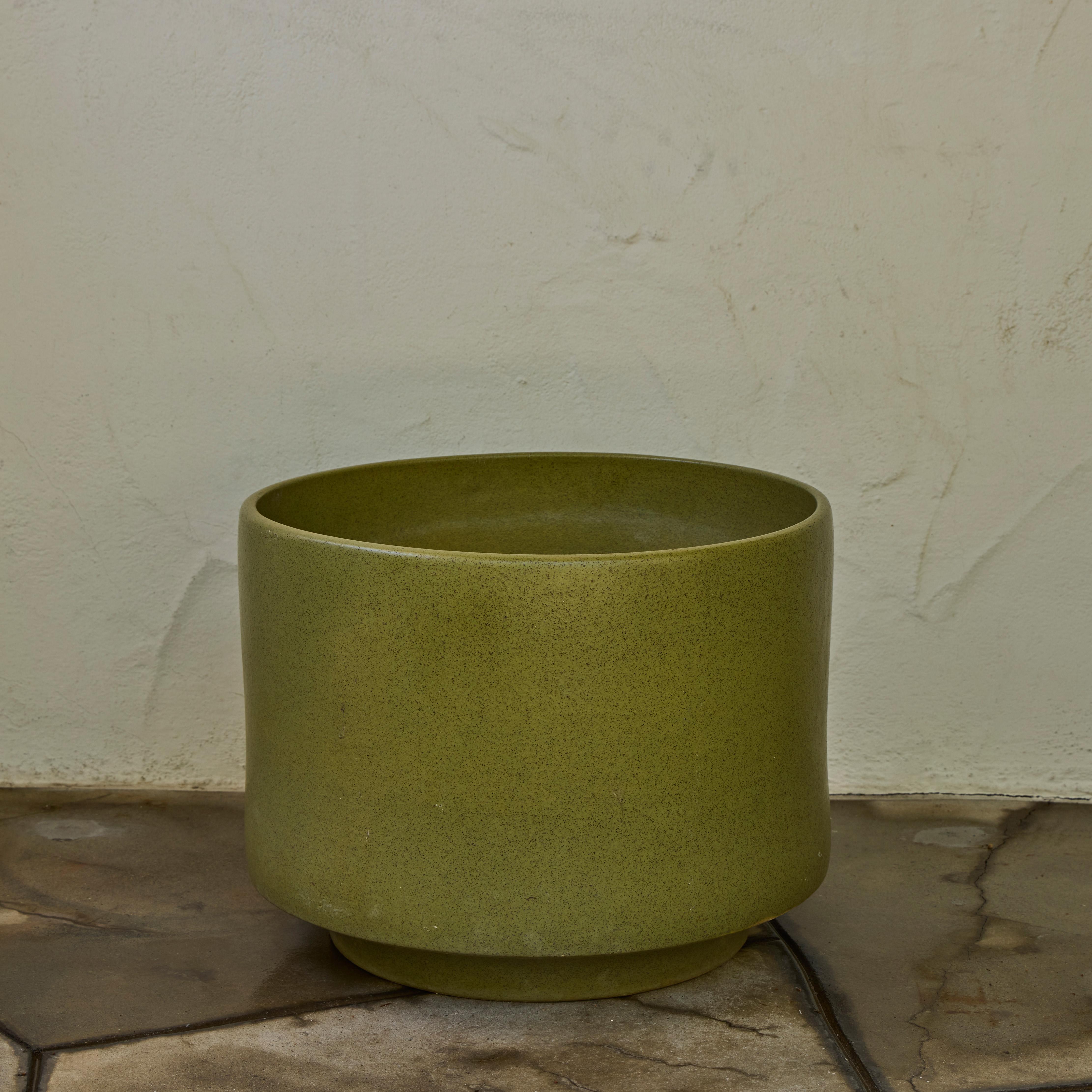 Monumental 1960s Gainey Olive Green Speckle Glazed Ceramic Planter.

Executed in matte white glazed ceramic. A very clean and increasingly rare example attributed to iconic ceramics manufacturer Gainey Ceramics, circa 1960s. Drilled; some losses on