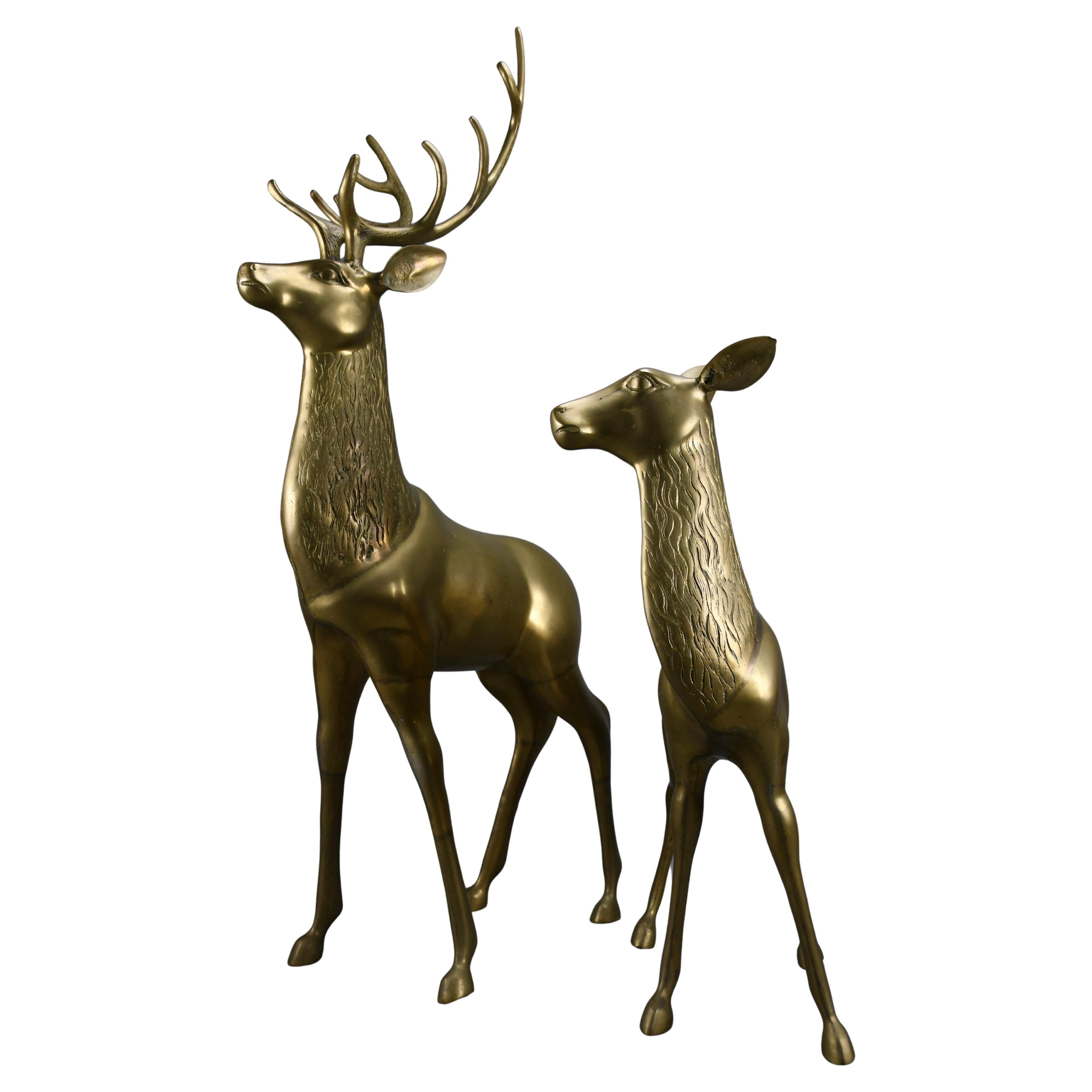 Monumental 1970
s Hollywood Regency brass deer pair attributed to Maison Jansen For Sale