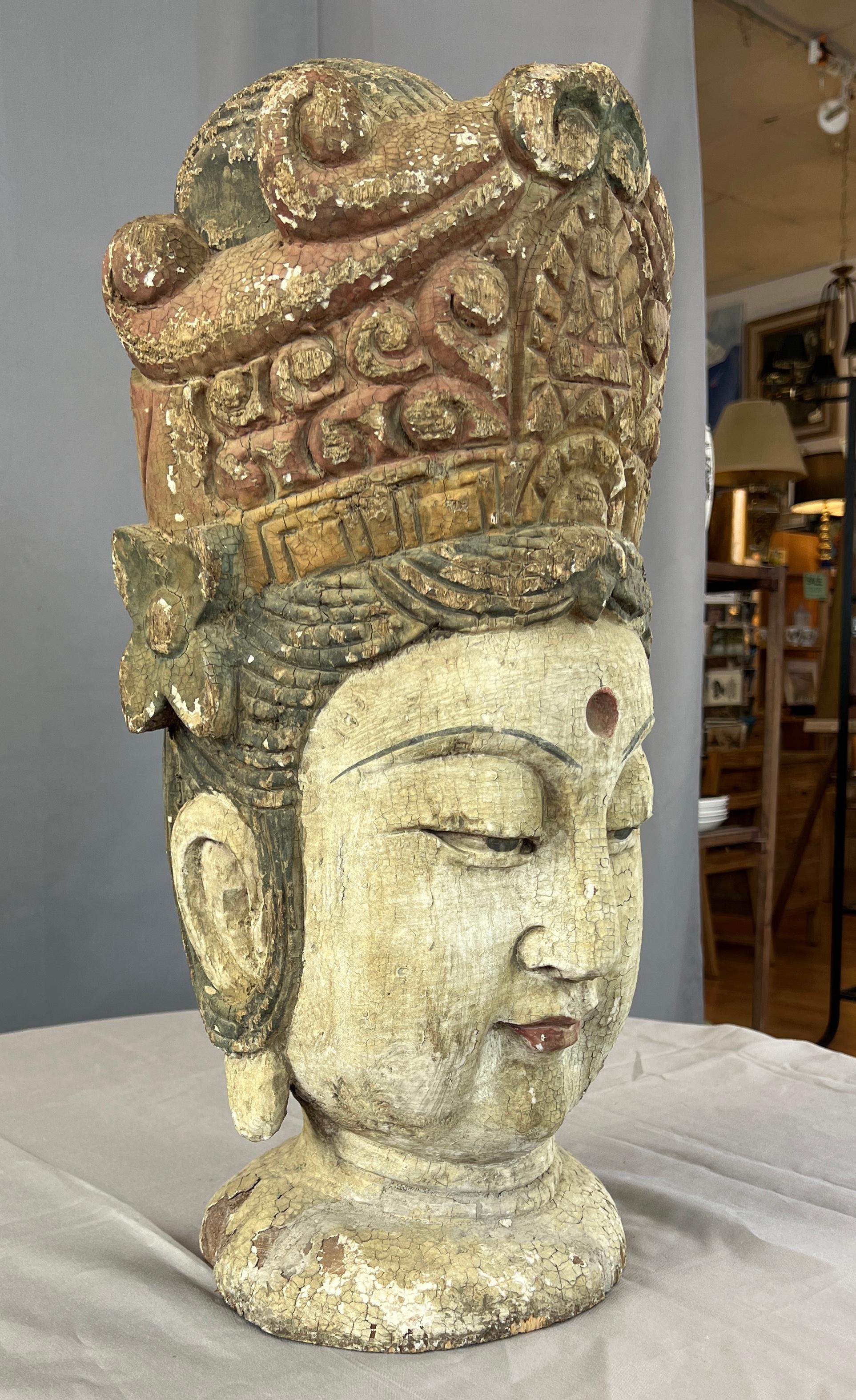 Offered here is a monumental carved wood Quan Yin ( also spelled as Kuan Yin or Guan Yin) bust, from the Qing dynasty.
Has export wax stamp on top.

