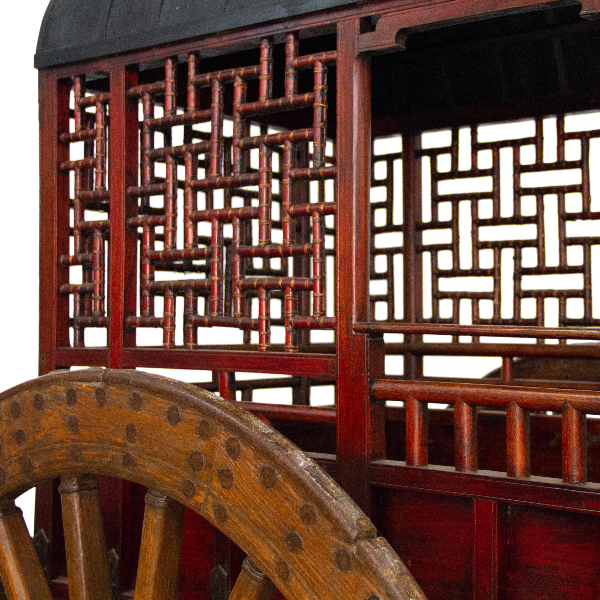 Remarkably well-preserved, this 19th-century covered ox cart is an exceptional example of the preferred mode of transportation by the Qing-dynasty elite. Gaining popularity in the late Han dynasty, oxen-drawn wagons such as this provided better