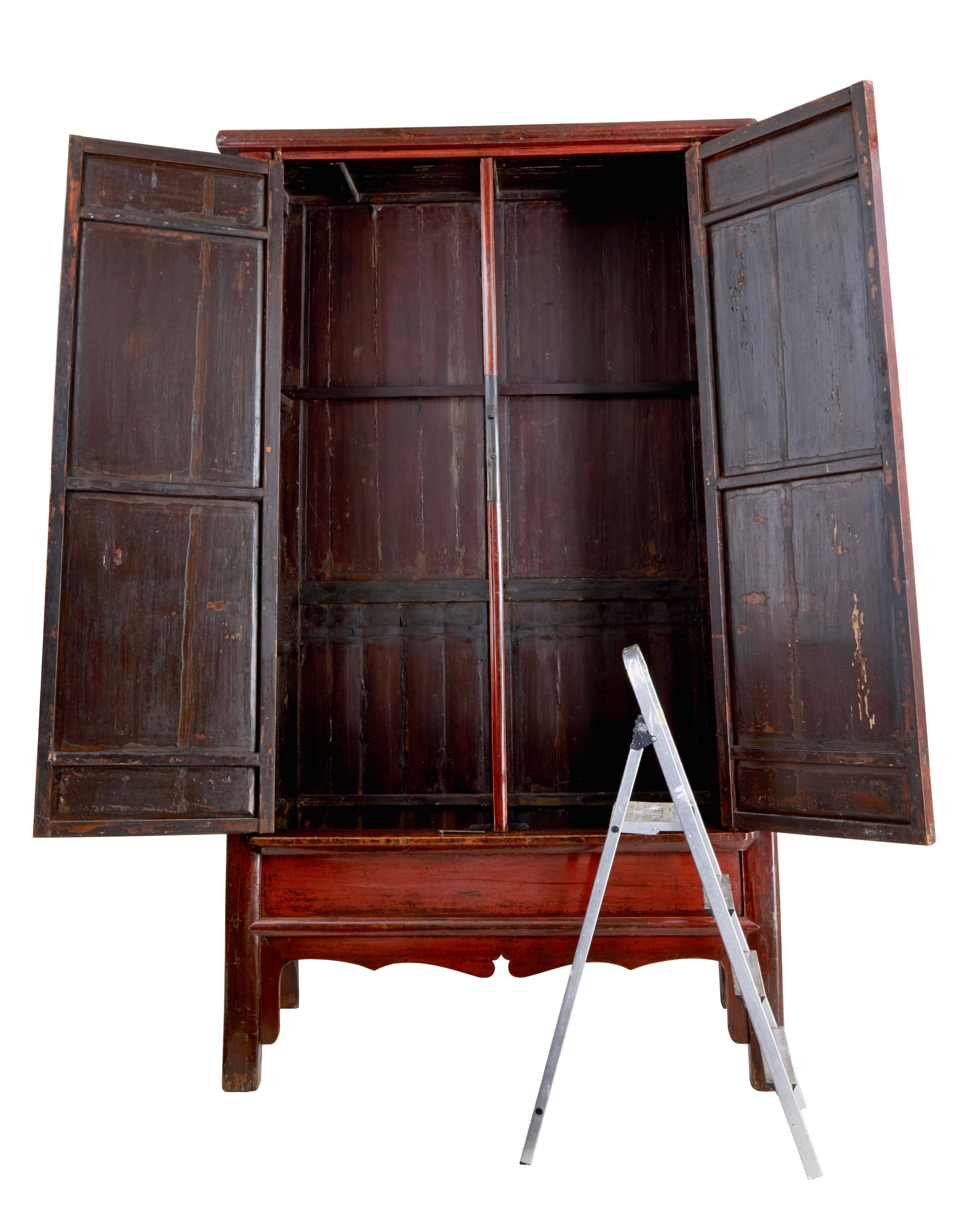 Monumental 19th century Chinese red lacquer cupboard circa 1870.

Stunning Chinese cupboard of the largest proportions we have ever seen.  Circa 1870. Stunning distressed red lacquer finish. Massive decorative piece with plenty of possibly uses.