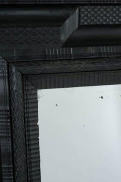 Monumental 19th Century Ebonized Ripple-Molded Mirror