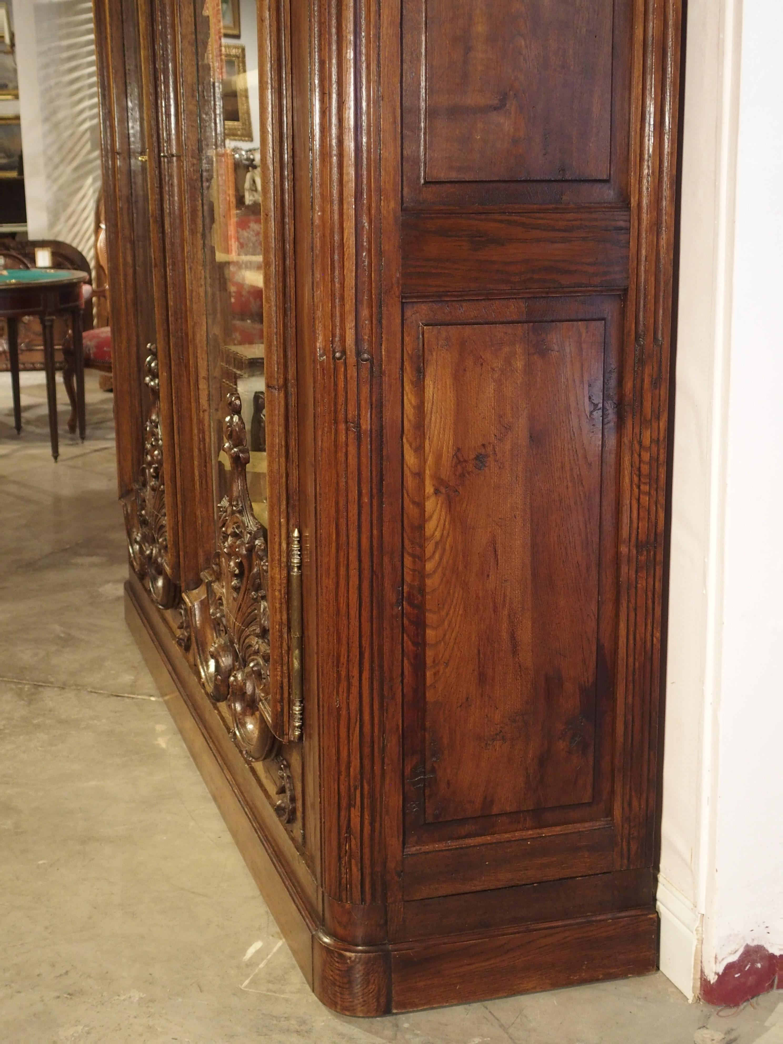 Monumental 19th Century French Oak Bibliotheque-Vitrine “Rocaille” In Good Condition In Dallas, TX