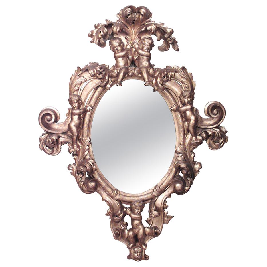 Espejo de Pared Victoriano Francés Monumental Tallado en Madera de Giltwood con Diseño de Cupido en venta