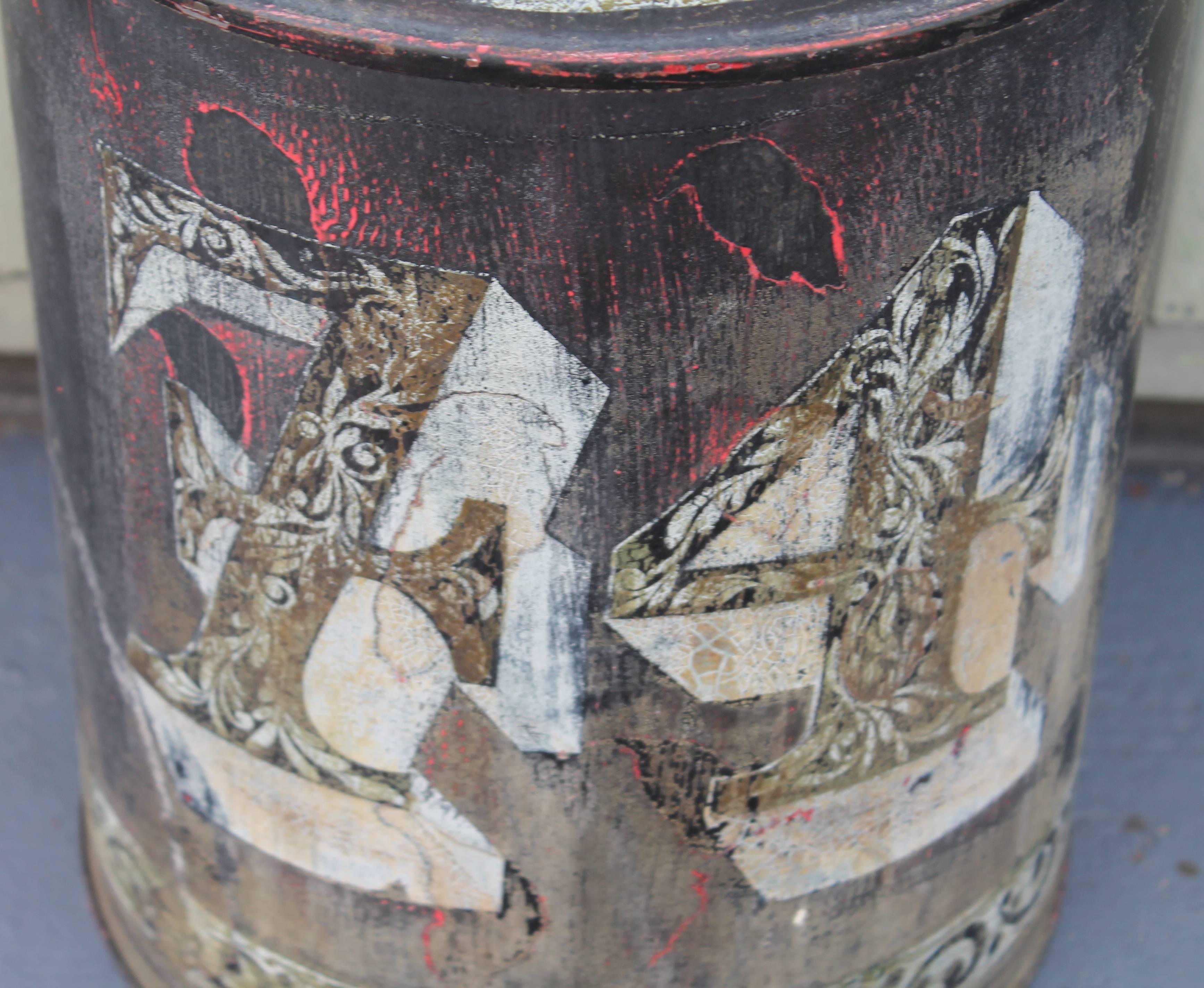 This early Primitive, original painted tin can has 74 painted on the face of the canister and has the original lid with a porcelain knob. Condition is very good and has a wonderful patina.