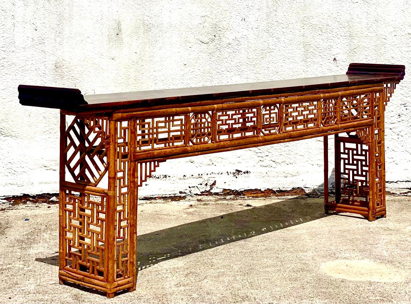 Stunning 19th century Quing Dynasty bamboo altar/console table. Exquisite Chinese Chippendale design in the bamboo. A truly special and one of a kind showstopper. Acquired from a Palm Beach estate.