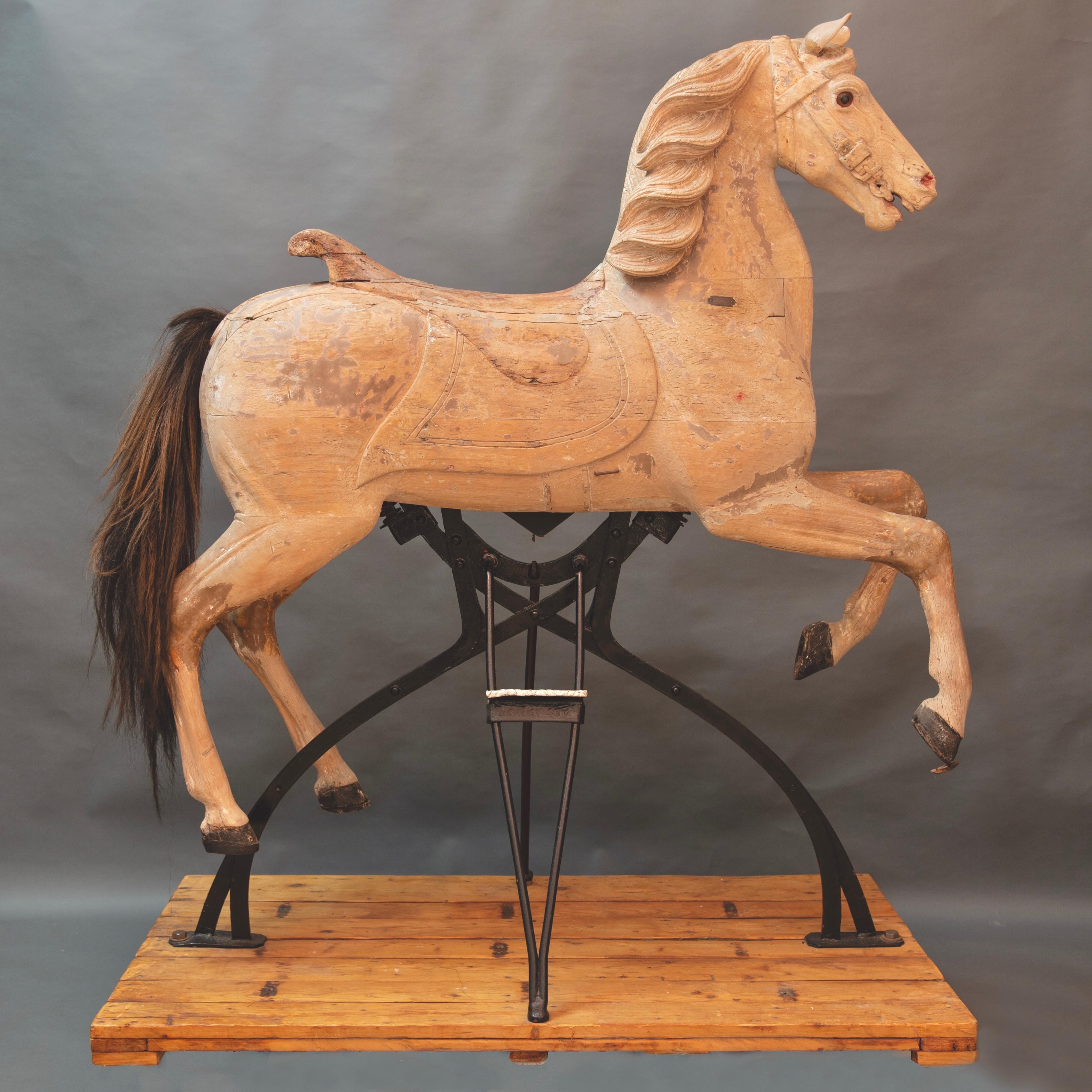 Freidrich Heyn Sculpter
Large hand carved wooden Carousel rearing horse with original label.
Gala Parade Luxury “Half Knight” rocking horse model.
 Published in Richard Ward and Geoff Weedon’s Fairground Art book on page 45 (photos on