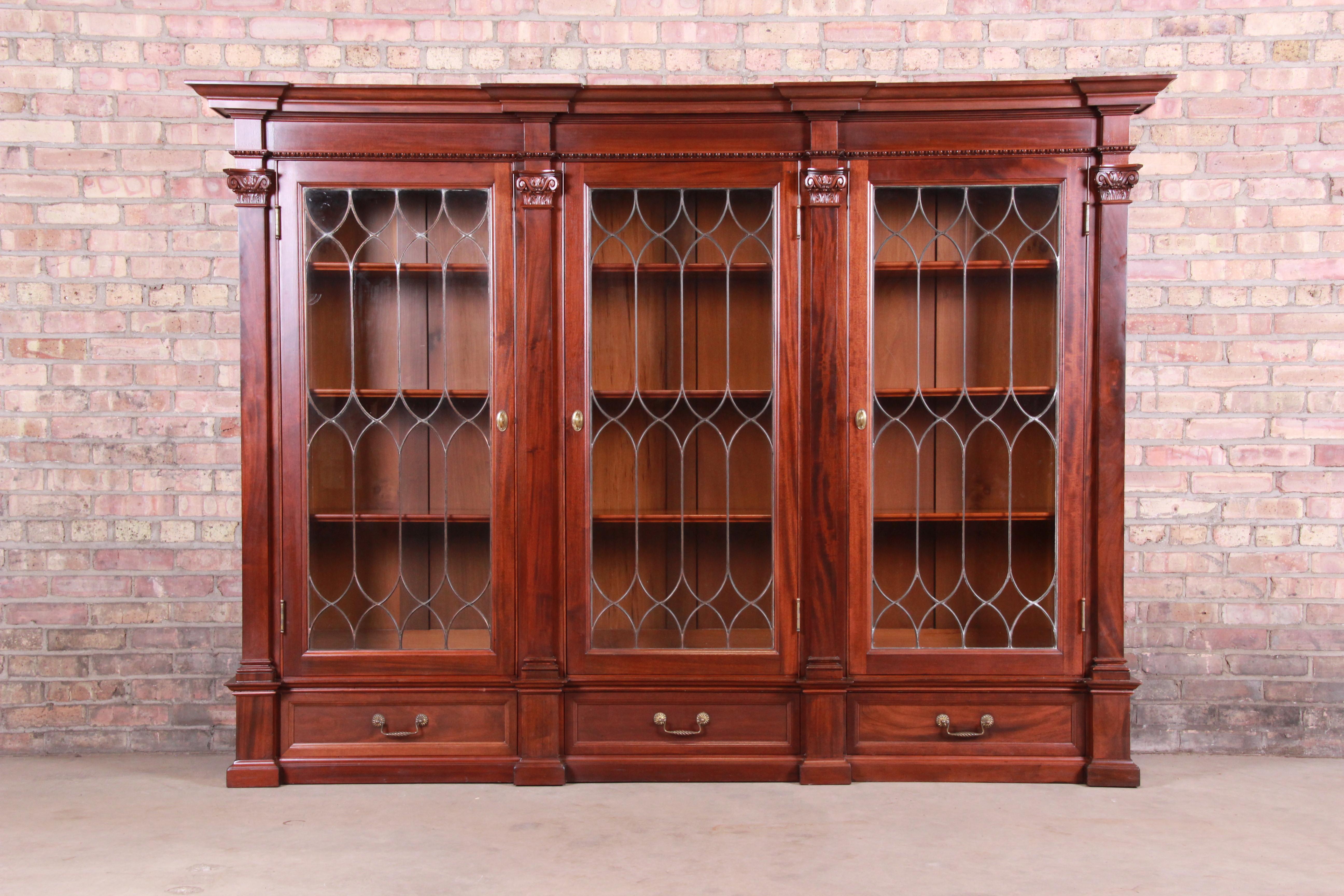 Brass Monumental 19th Century Victorian Mahogany and Leaded Glass Triple Bookcases