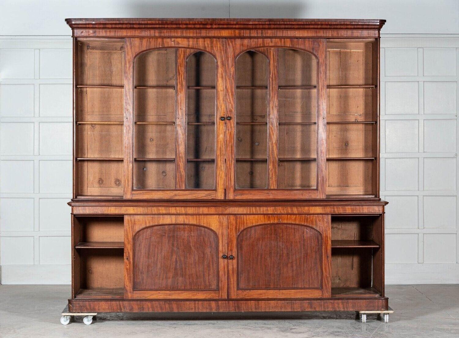 circa 1870
Monumental 19th C Arched English glazed mahogany library bookcase.
Arched sliding doors with adjustable shelves.
Excellent form and scale
sku 1196
W274 x D55 x H247cm
Base W270 x D55 x H93cm
Top W274 x D36 x H154cm.