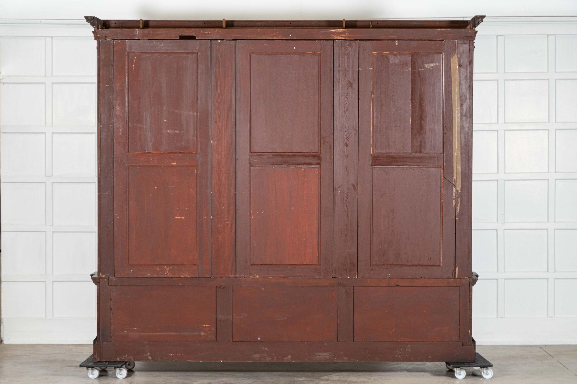 Monumentale libreria inglese del XIX secolo in mogano ebanizzato con ante a strappo in vendita 10