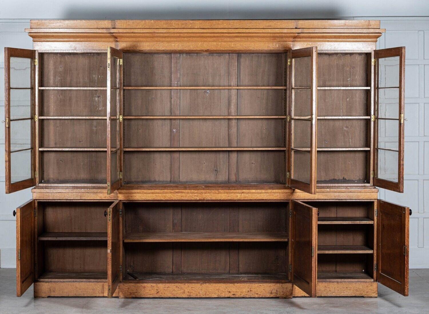 circa 1880
Monumental 19thC English Glazed Oak Breakfront Bookcase with adjustable shelves and keys
Excellent form, wear and colour. An exceptional example
sku 1162
W319 x D48 x H247 cm
Base W307 x D52 x H98 cm
Top W319 x D42 x H149 cm.