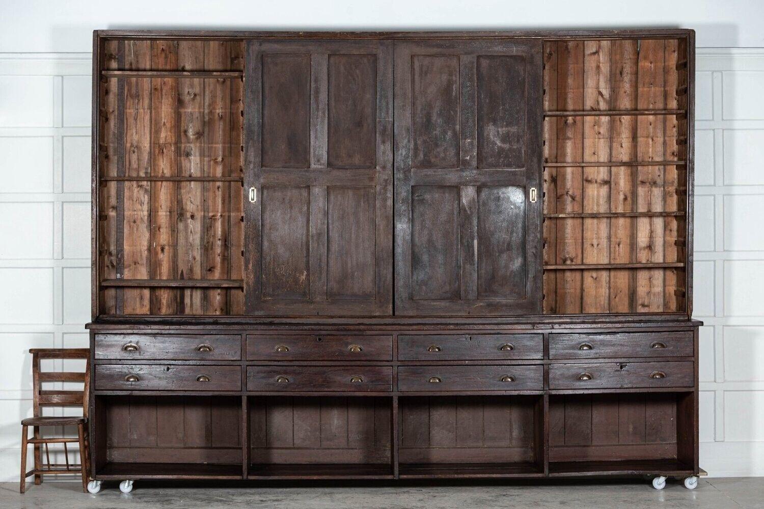 circa 1850
Monumental 19thC English Pine Housekeepers / Haberdashery Cabinet
Exceptional form and scale
sku 1161
W360 x D63 x H262 cm
Top W356 x D41 x H172 cm
Base W360 x D63 x H90 cm.
