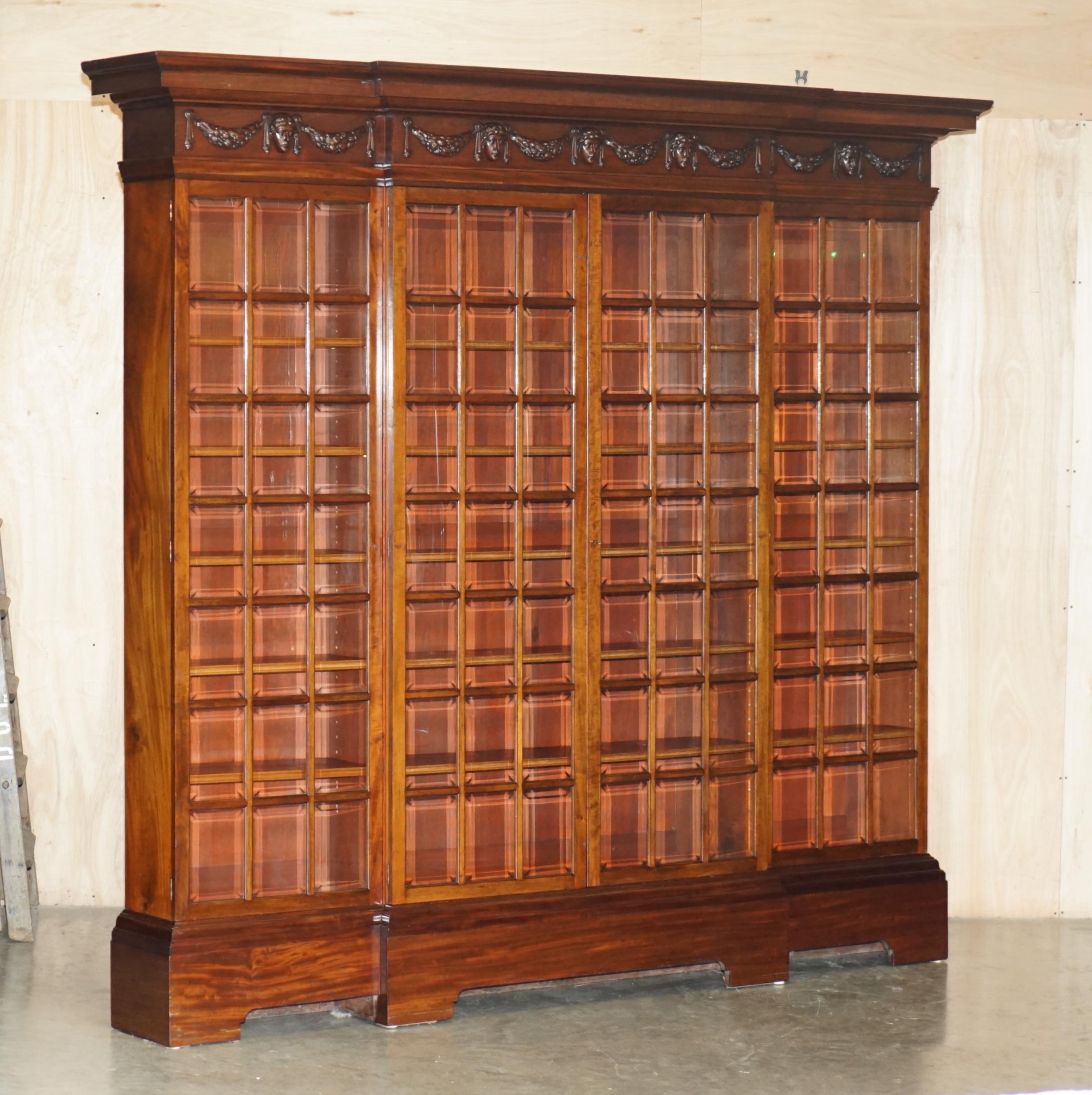Royal House Antiques

Royal House Antiques is delighted to offer for sale this exceptionally large and very grand Victorian circa 1860 hand carved Mahogany display bookcase with tapered glass panels 

Please note the delivery fee listed is just a