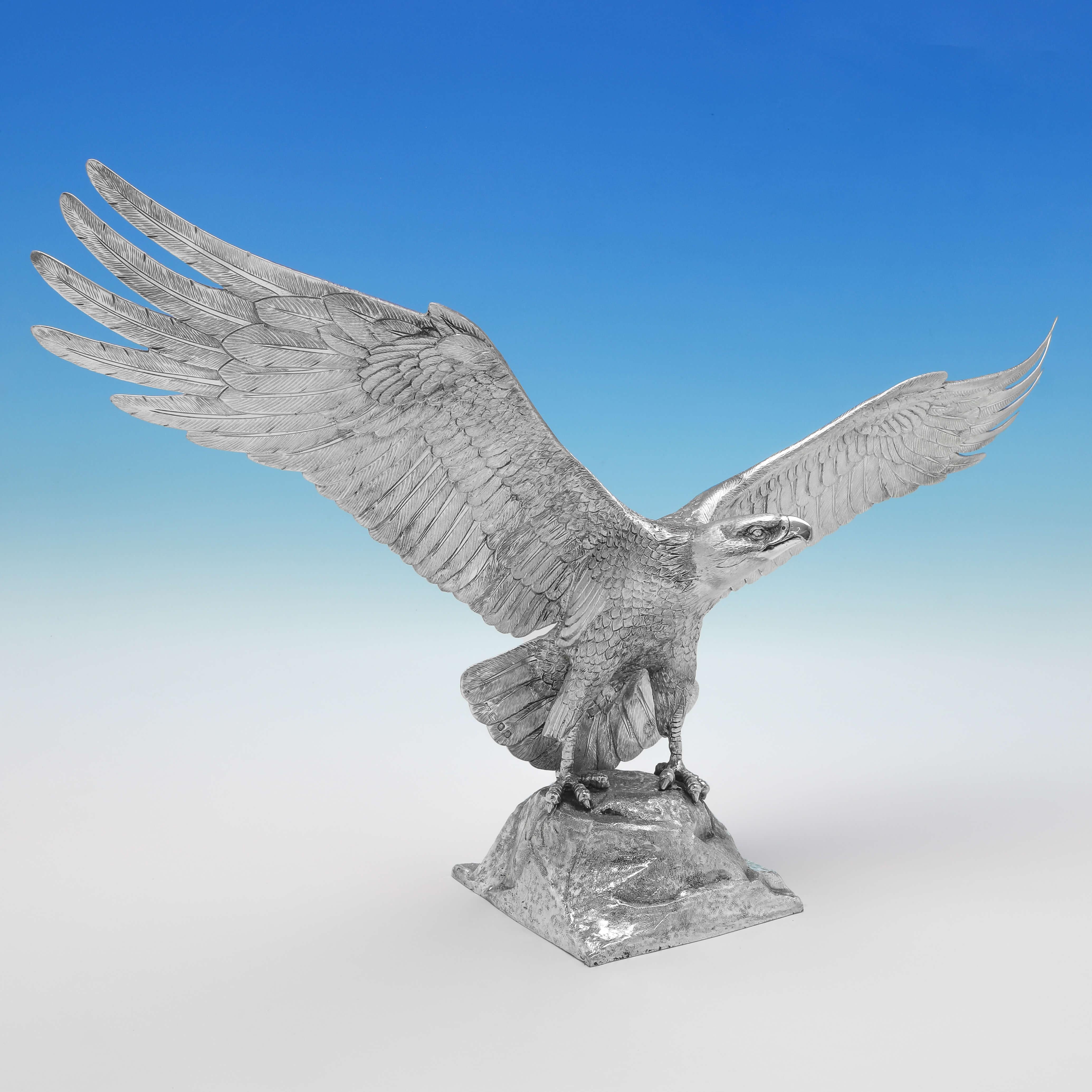 Hallmarked in London in 1995 by Garrard & Co., this wonderful, Sterling Silver Model of an Eagle, is realistically cast, modelled perched on a rock with its wings outstretched. The eagle measures 12.25