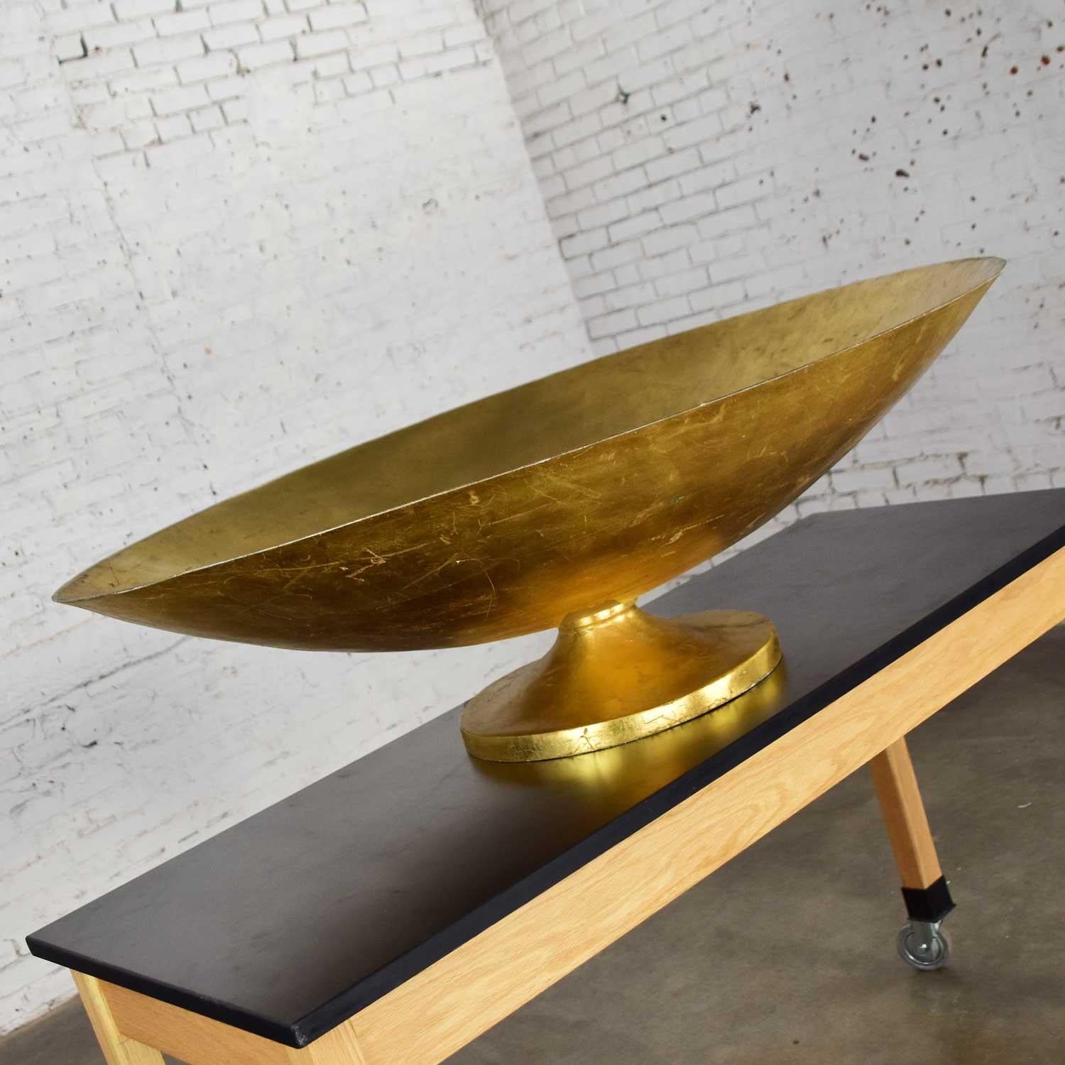 footed gold bowl