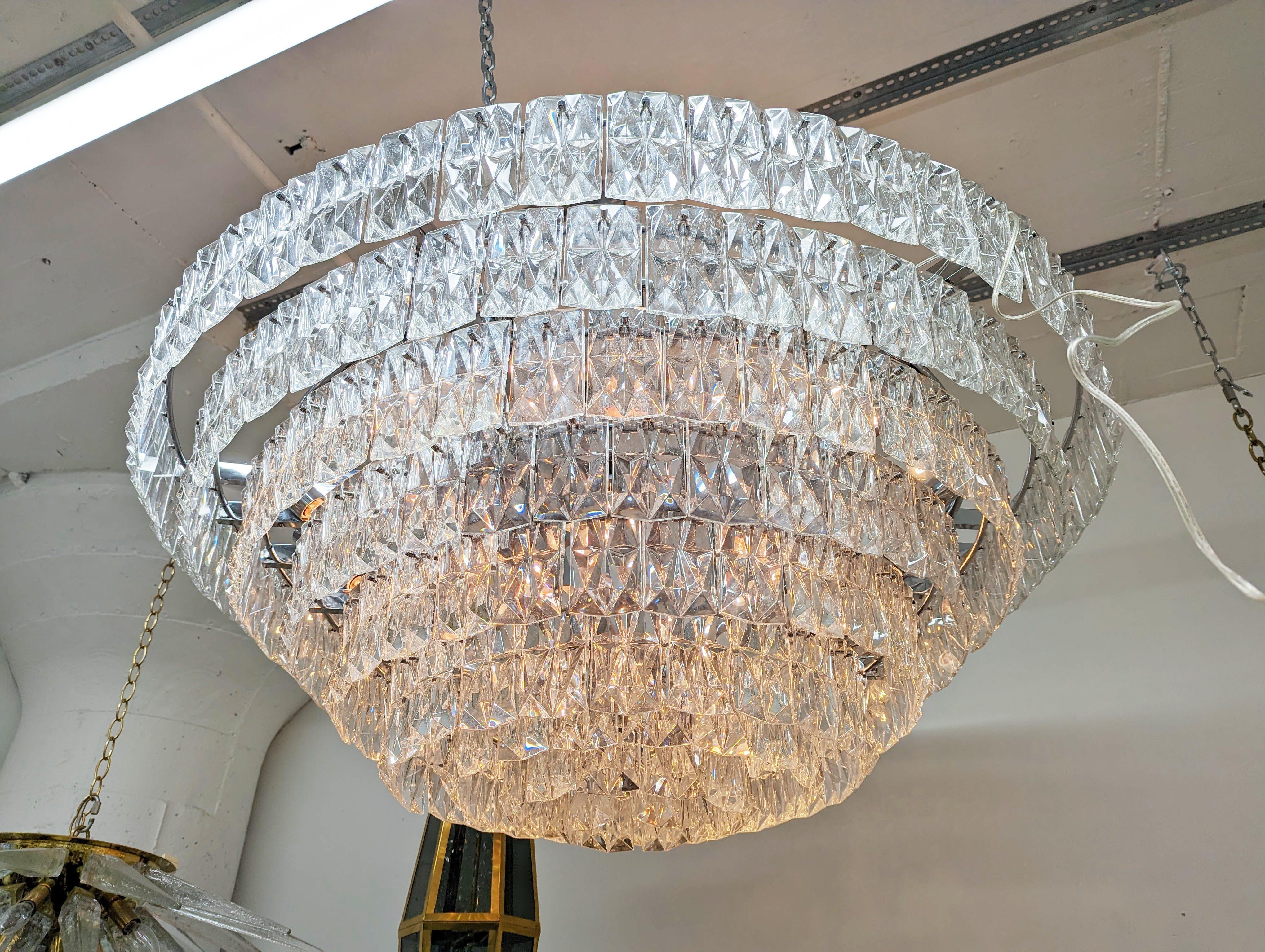 Monumental tiered crystal drop chandelier by Kinkeldey.

Creator: Kinkeldey

Origin: Germany

Circa: 1970s

Dimensions: 30