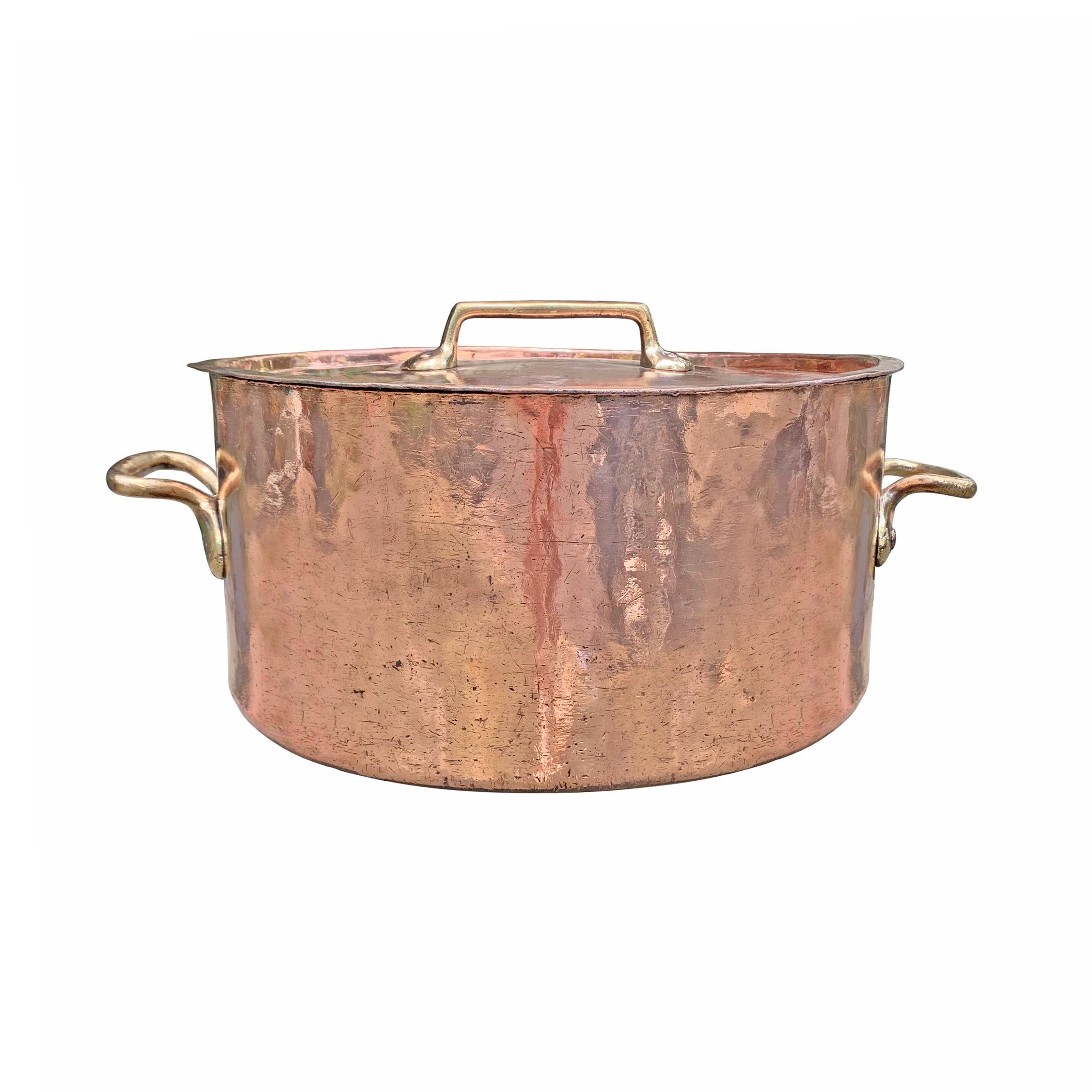 An incredibly rare monumental 19th century French hand-hammered 5-mm thick 65-quart copper pot with bronze handles, engraved with the number 