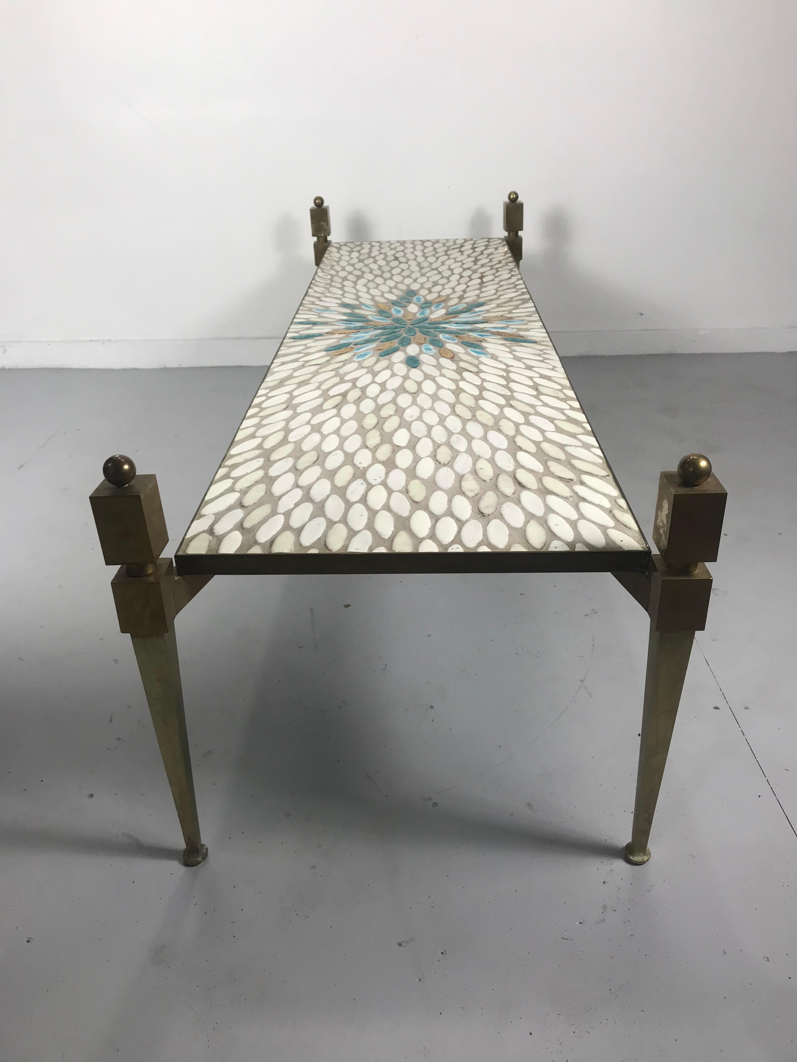 Stunning over the top, Italian brass and oval Mosiac tile coffee or cocktail table, Amazing quality and construction, Large egg shape mosaic tiles in blues, turquois and gold leaf, monumental brass finials, Photos do no justice, Hand delivery avail
